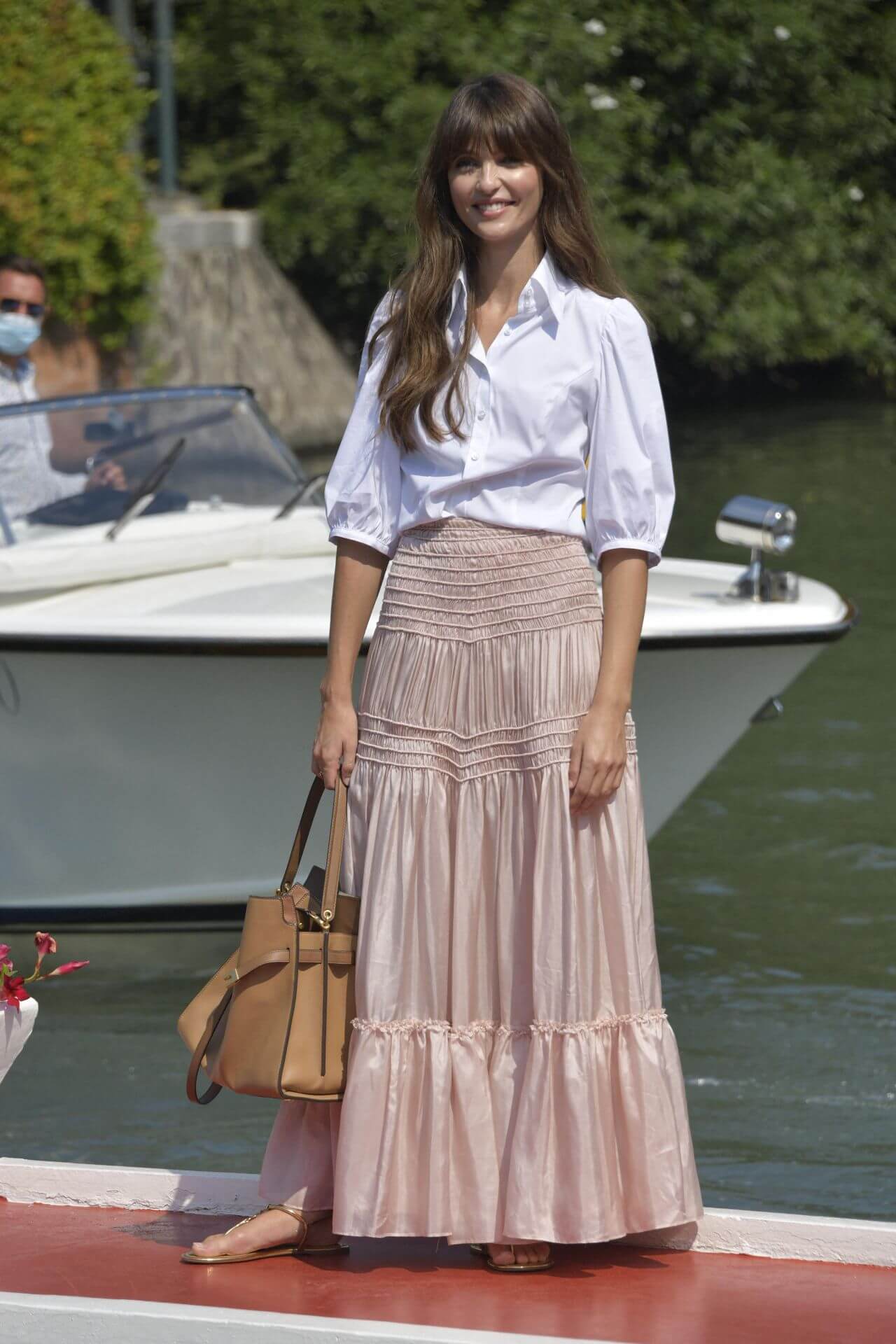 Annabelle Belmondo In White Collar Baggy Sleeves Shirt With Pleated Long Skirt Arriving at the Excelsior Hotel in Venice