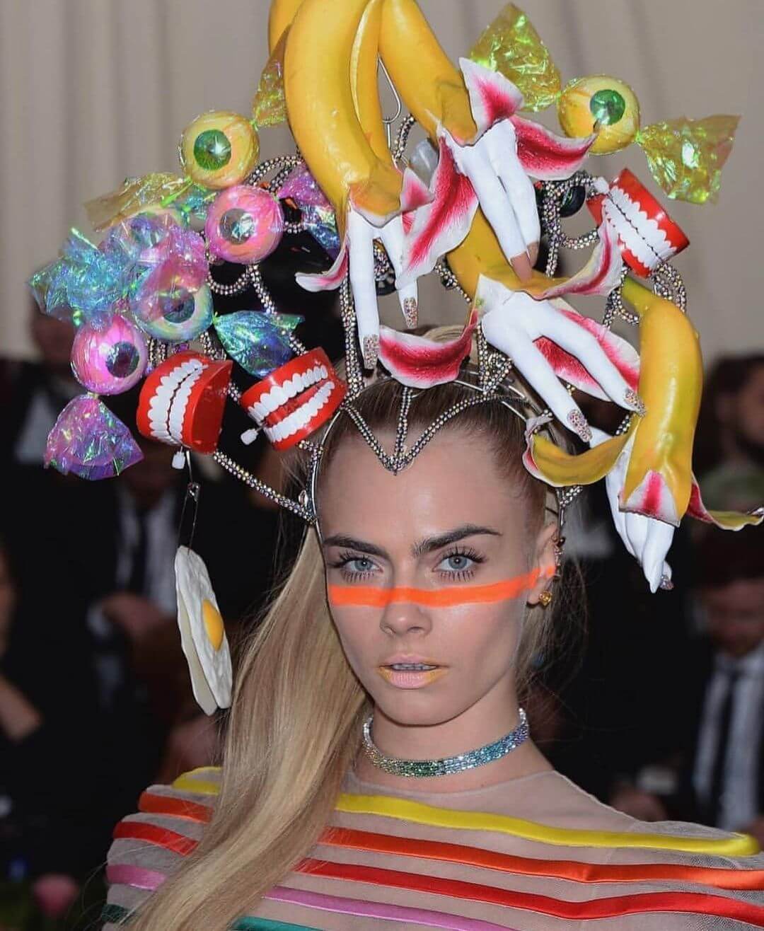 Cara Delevingne Shines at the 2019 Met Gala with Spectacular Rainbow Dior Look and Statement Headdress