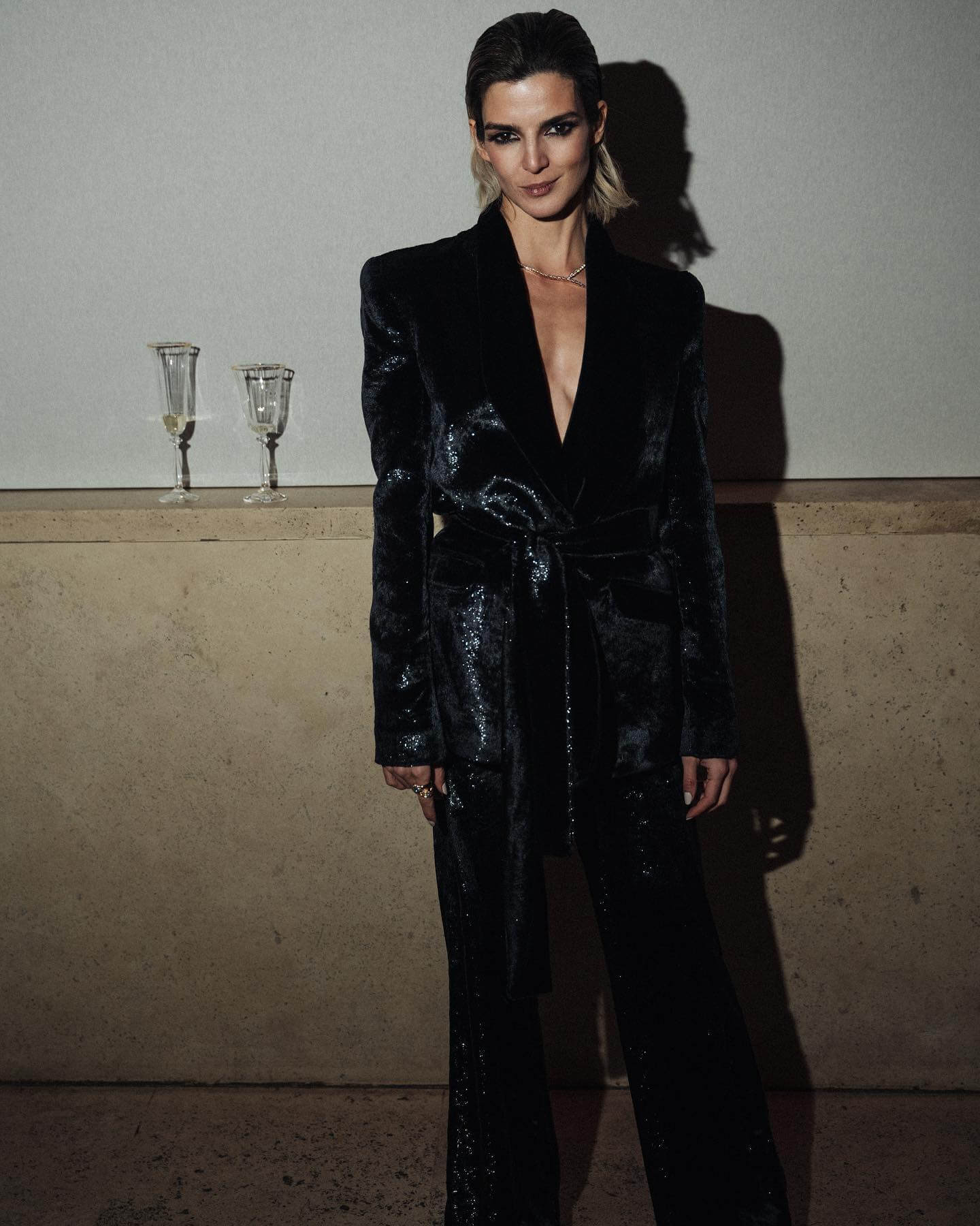 Clara Lago  In Black Shimmery Pants With Long Blazer Outfit