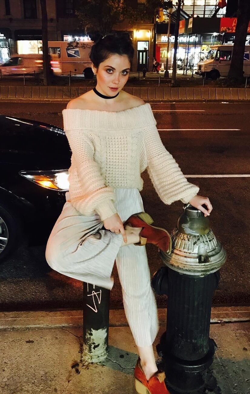 Gracie Gillam In Off White Baggy Sweater &  Flare Pants With Black Choker