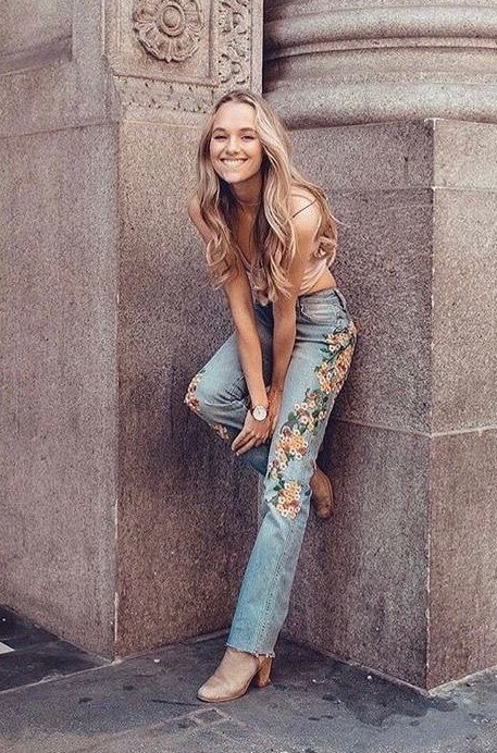 Madison Iseman In Dusky Pink Crop Top With Blue Denim Floral Design Jeans With Blond Hair