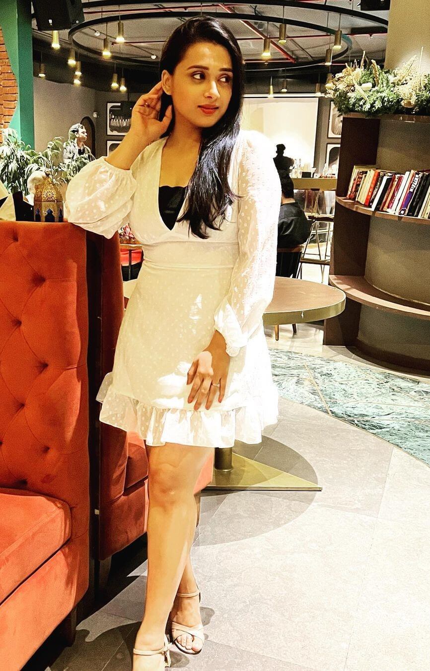 Radhika Muthukumar In White V-Neckline Fit & Flare Dress