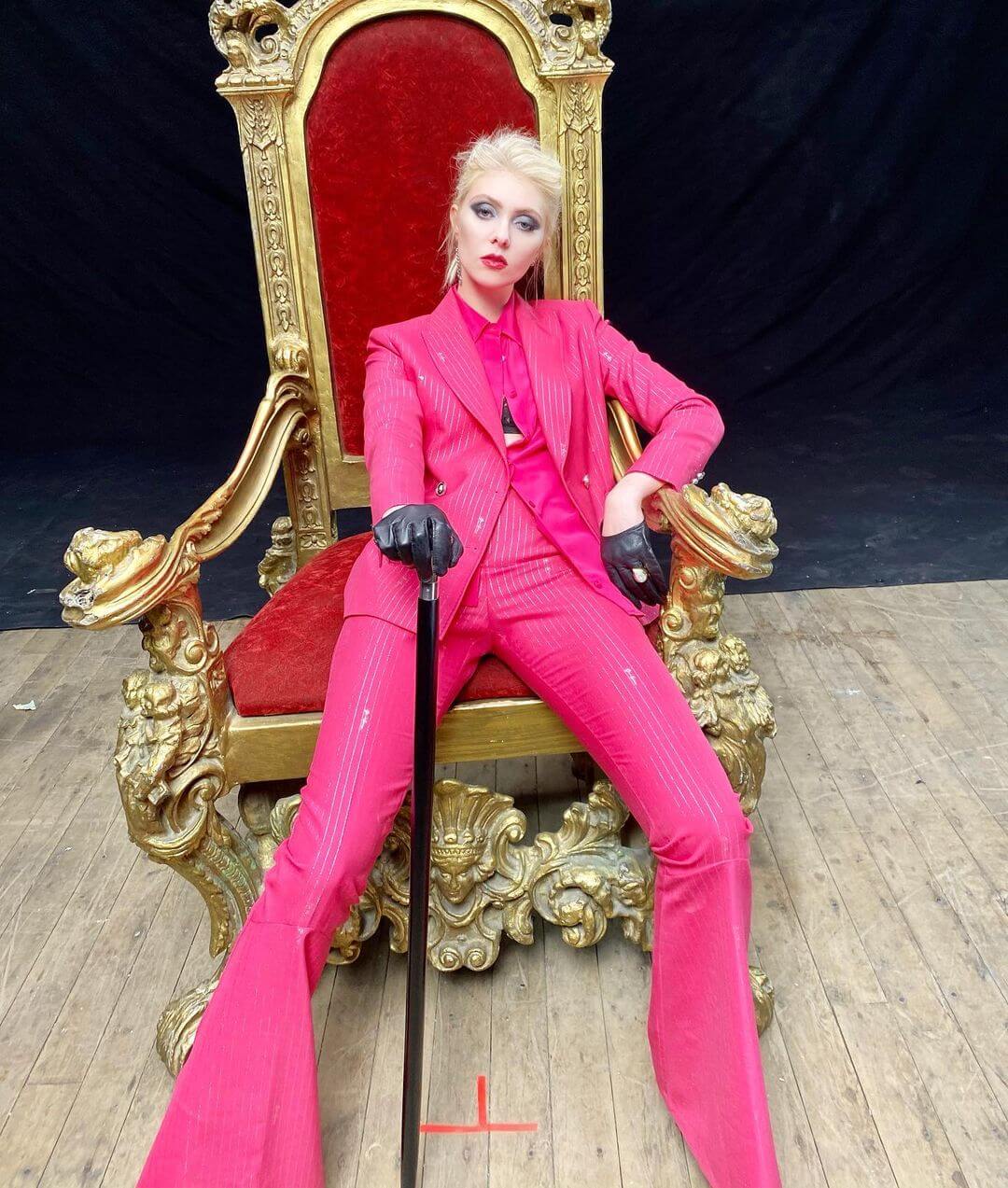 Radiant Taylor Momsen in a pink suit and pants
