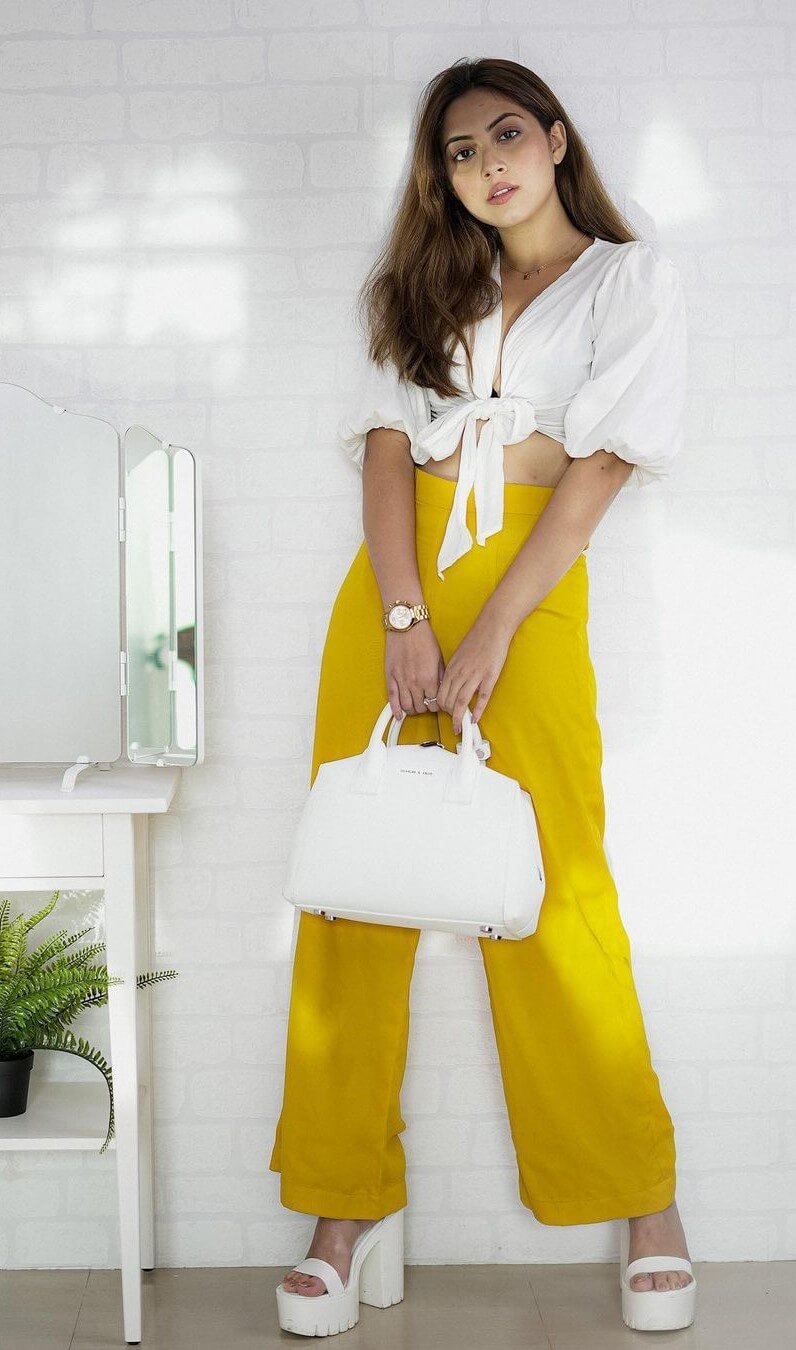 Reem Shaikh Comfy Summer Casual Look In White Crop Shirt With Yellow Flared Pants