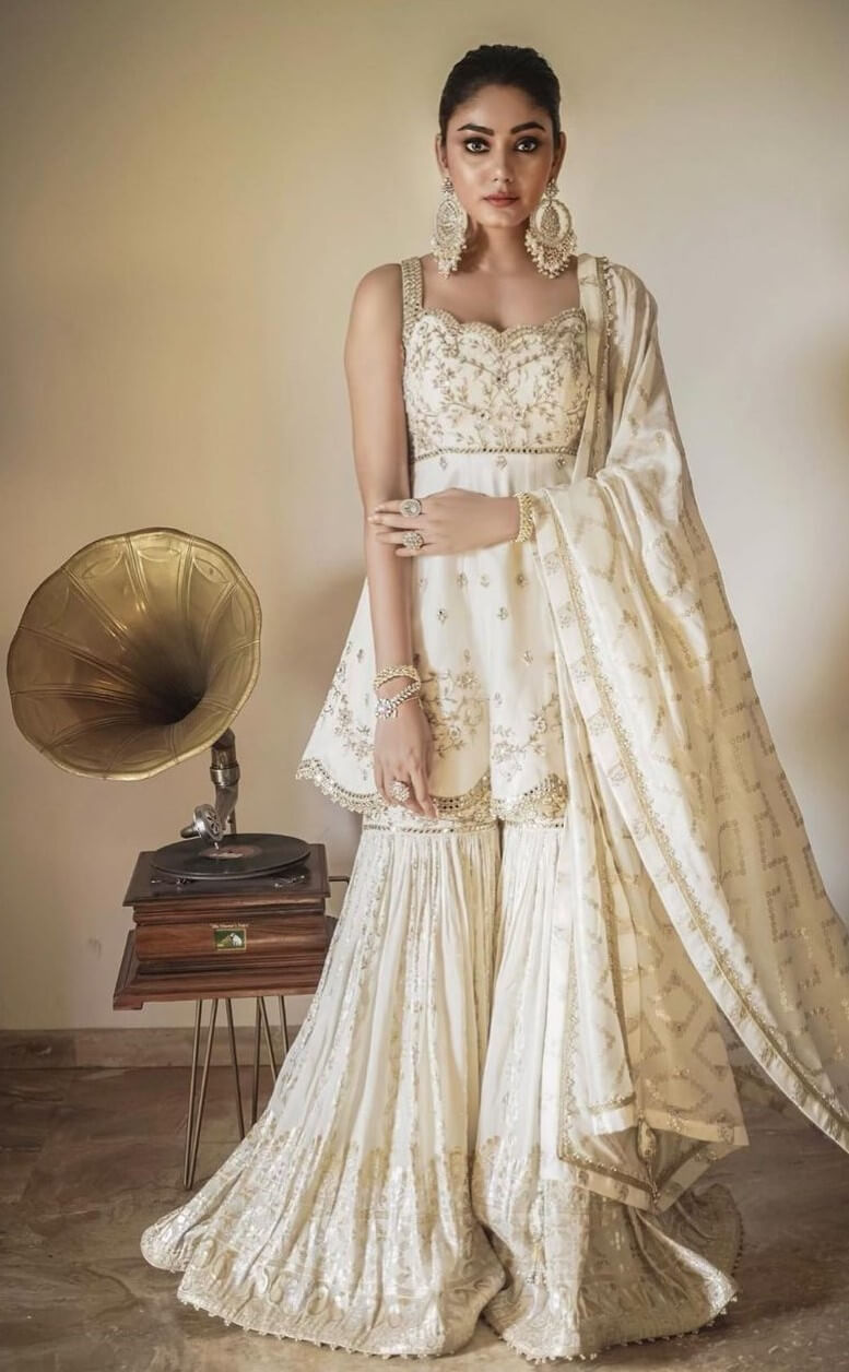 Sana Makbul In Off White Golden Embroidery Gharara Suit With Heavy Earrings