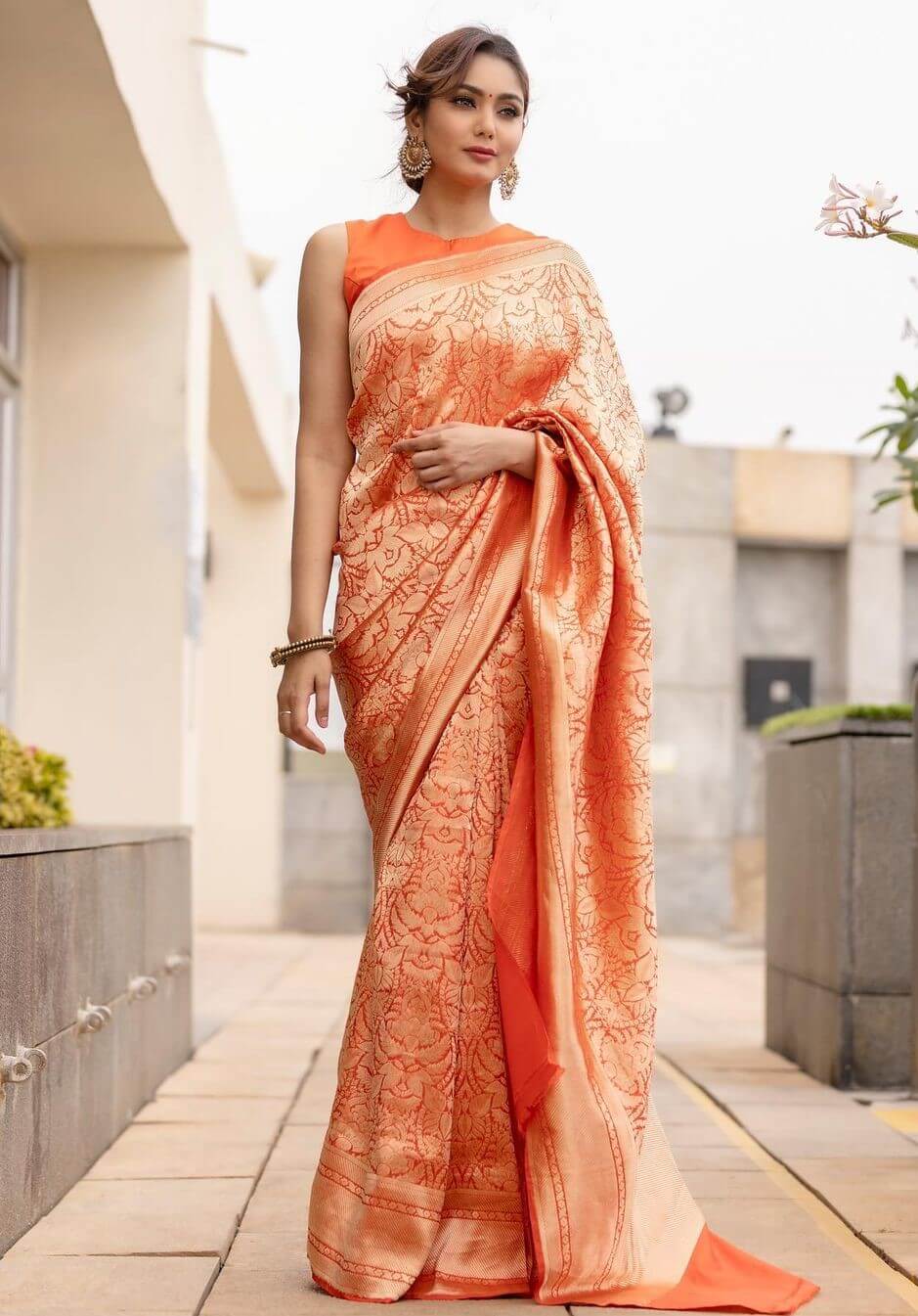 Sana Makbul In Orange Banarasi Silk Saree With Sleeveless Blouse