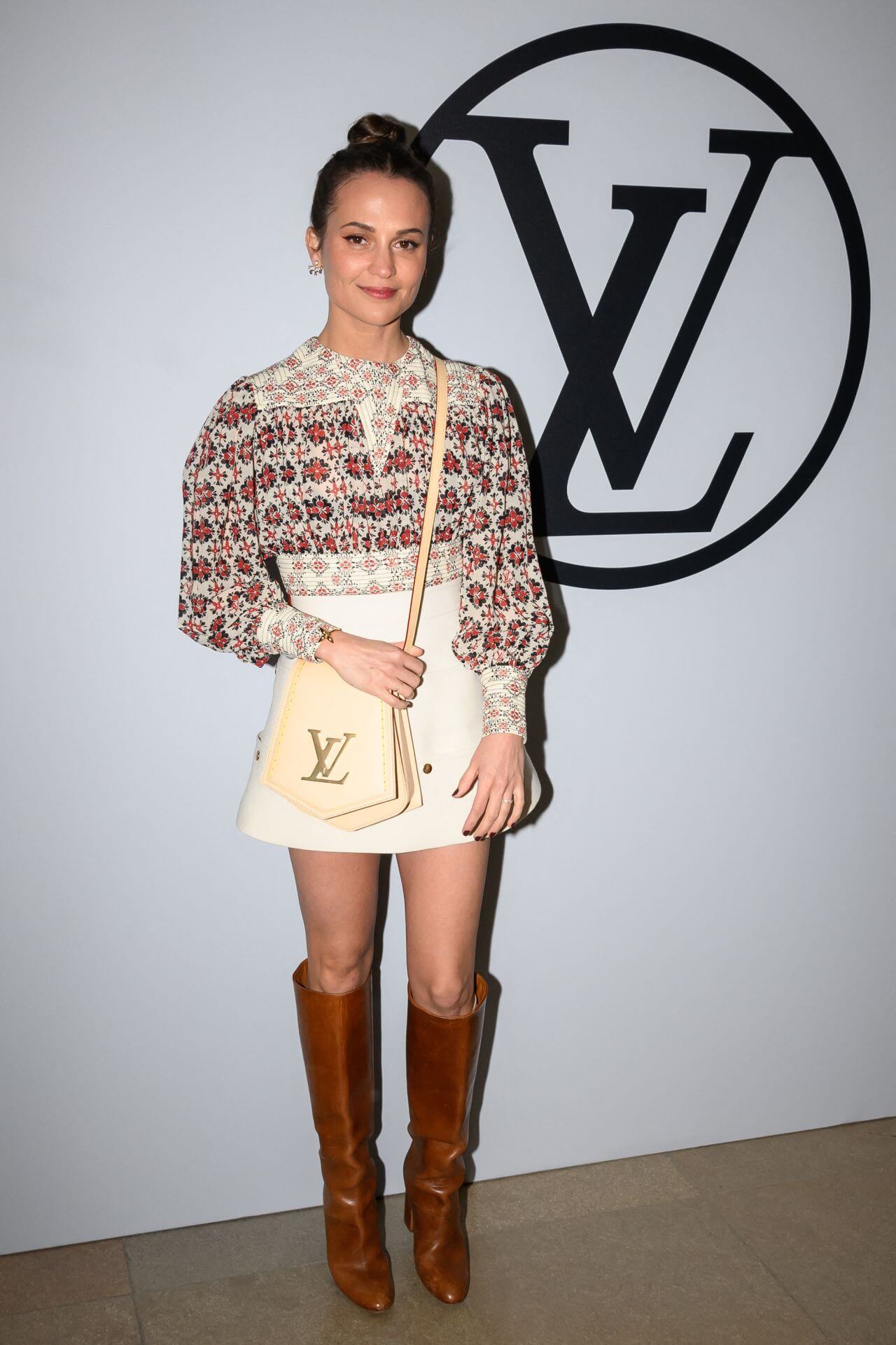 Alicia Vikander - Gorgeous Looks In Printed Puffed Sleeves Top With White Mini Skirt Outfits