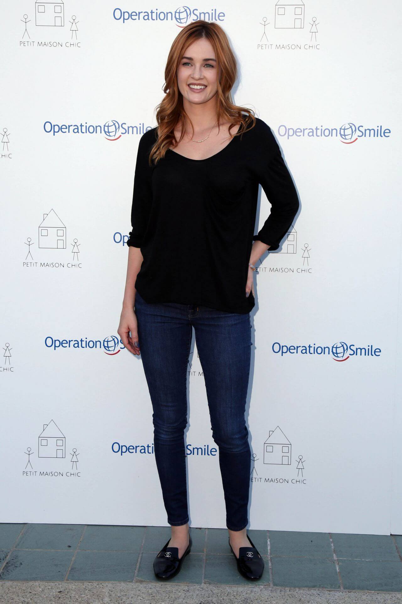 Ambyr Childers In Black Full Sleeve Top With Denim Jeans At Petit Maison Chic Fashion Show in Beverly Hills
