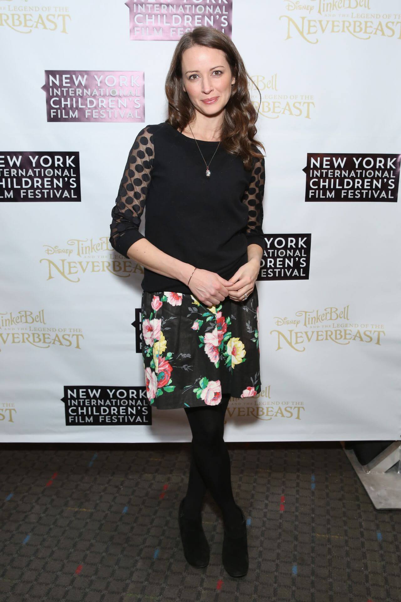 Amy Acker  In Black Full Sleeves Top & Floral Print Mini Skirt With Stockings At ‘Tinker Bell ’ NYICFF Special Screening