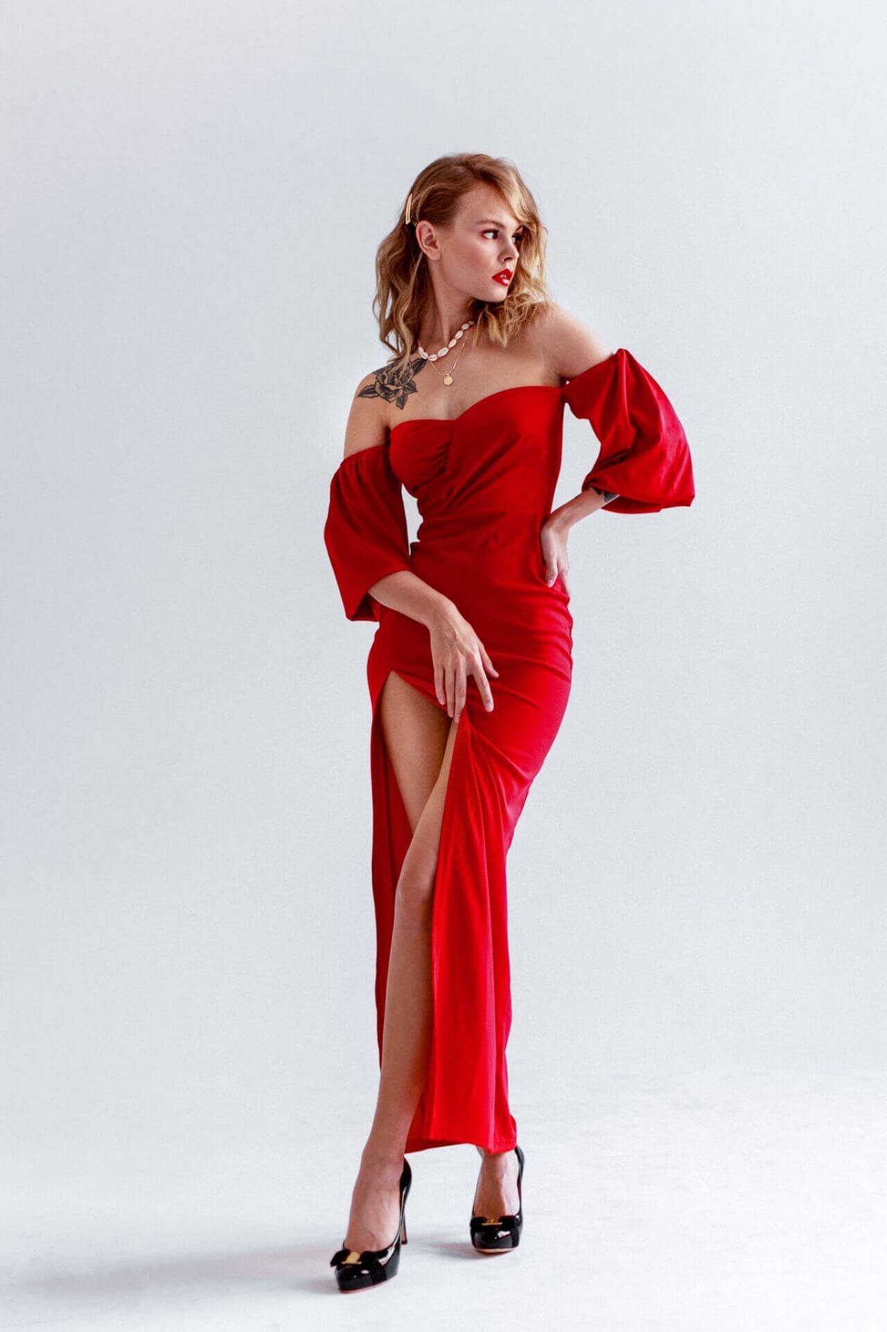 Anastasiya Scheglova In Red Off Shoulder With Baggy Sleeves Long High Slit Cut Dress At Photoshoot