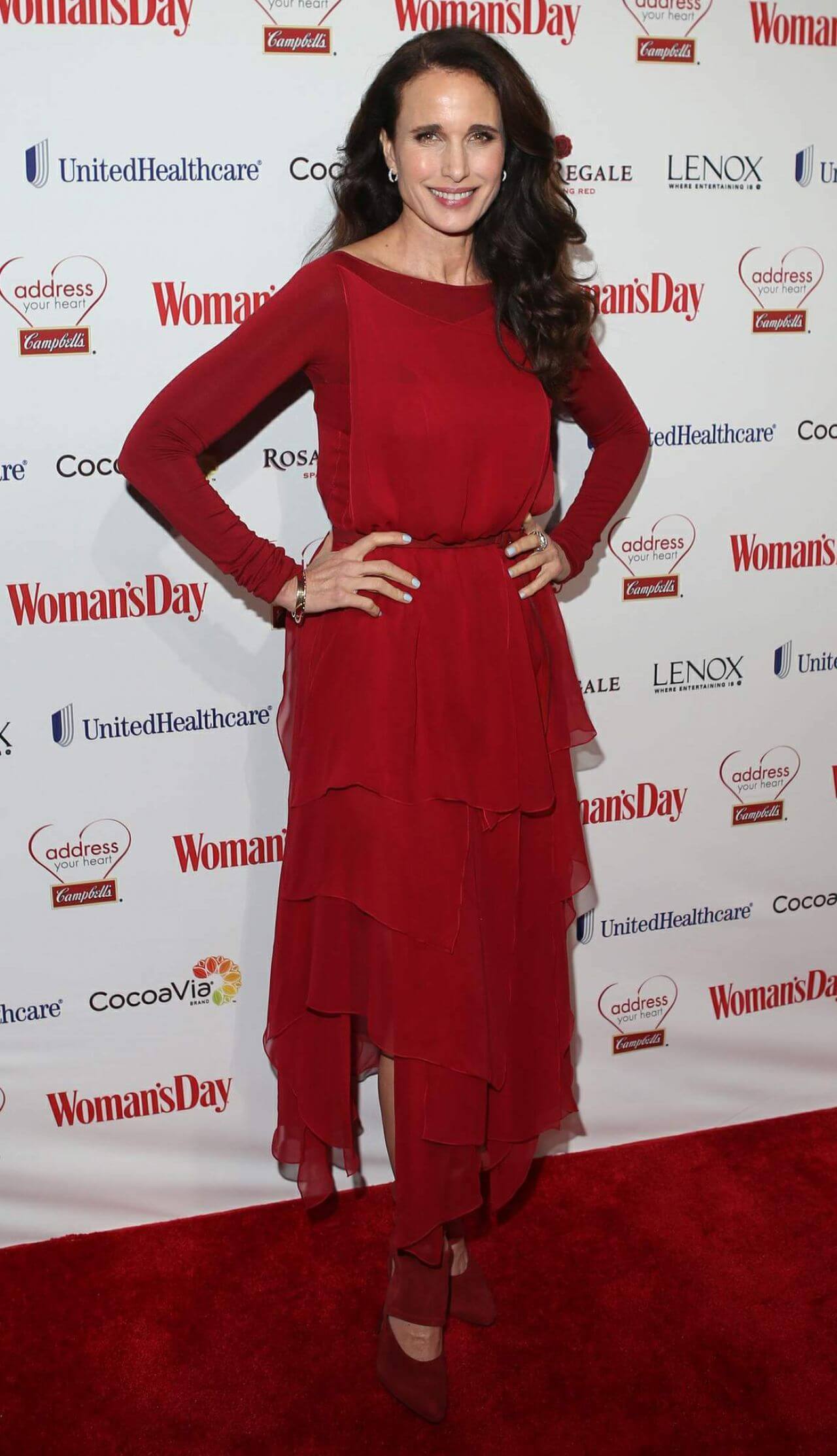 Andie MacDowell  In Red Full Sleeves Ruffle Gown At Woman’s Day Red Dress Awards
