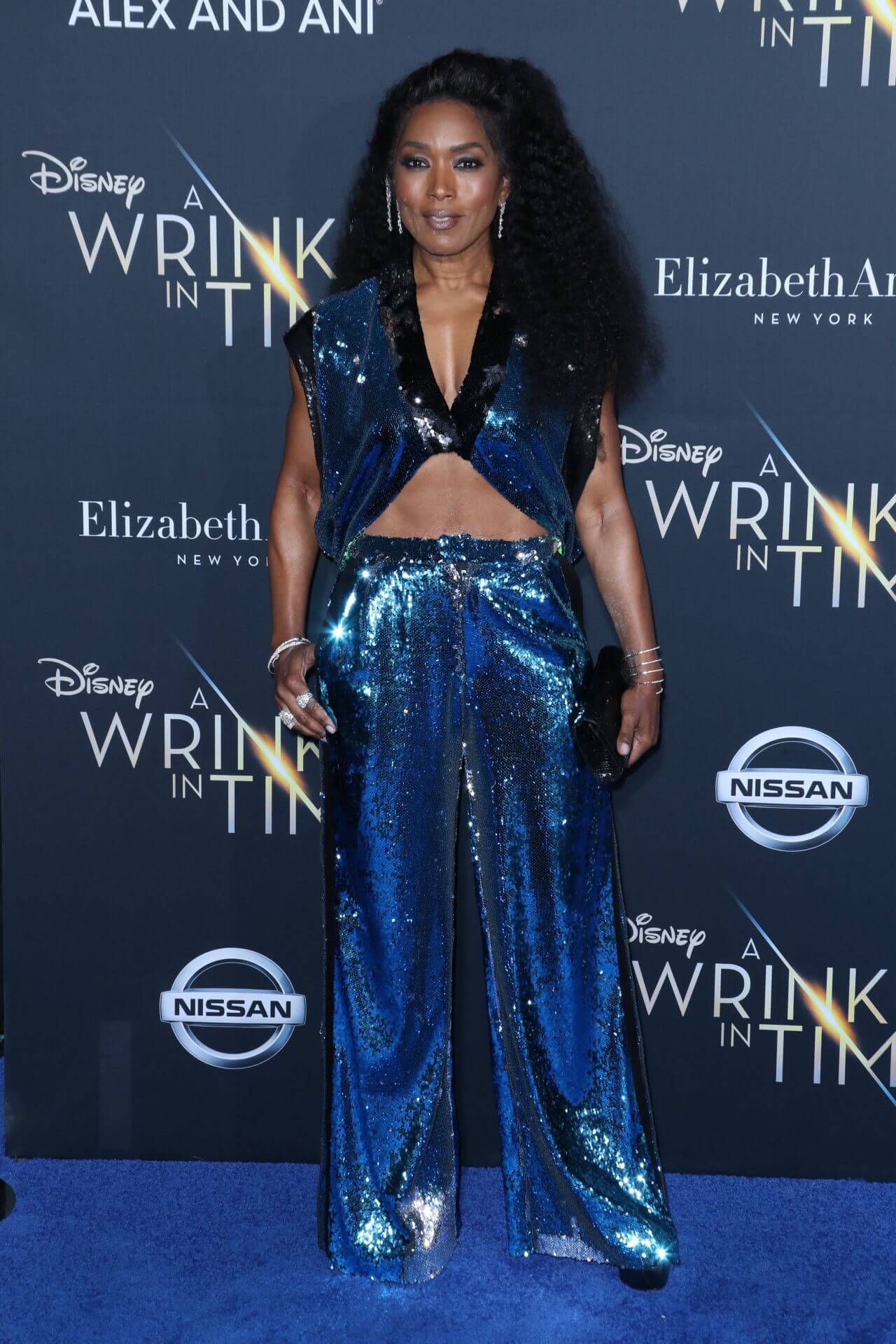 Angela Bassett In Blue Shimmery Crop Top With Long Flare Pants At“A Wrinkle in Time” Premiere in Los Angeles