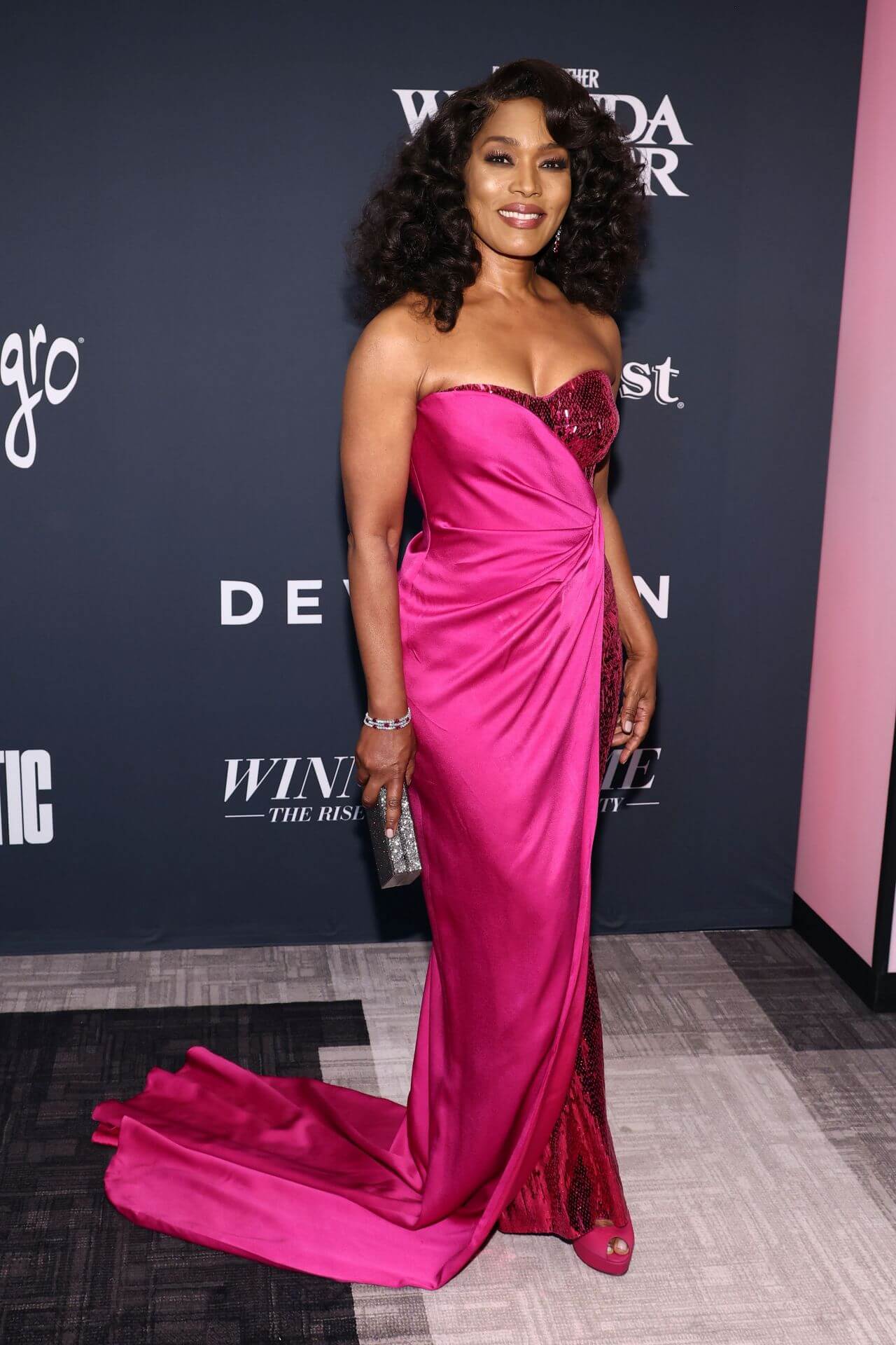 Angela Bassett In Pink & Red Shiny Fabric Sweetheart Neck off Shoulder Long Gown At Celebration Of Black Cinema & Television in LA