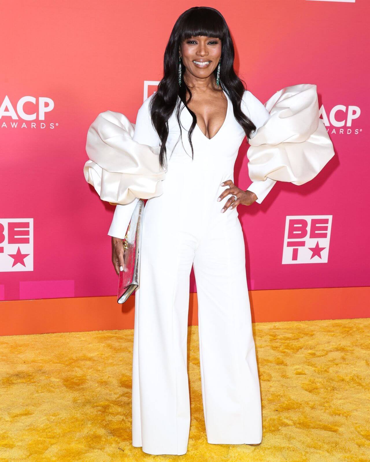 Angela Bassett In White V Neck With Puffed Baggy Sleeves Long Jumpsuit At 54th NAACP Image Awards in Los Angeles