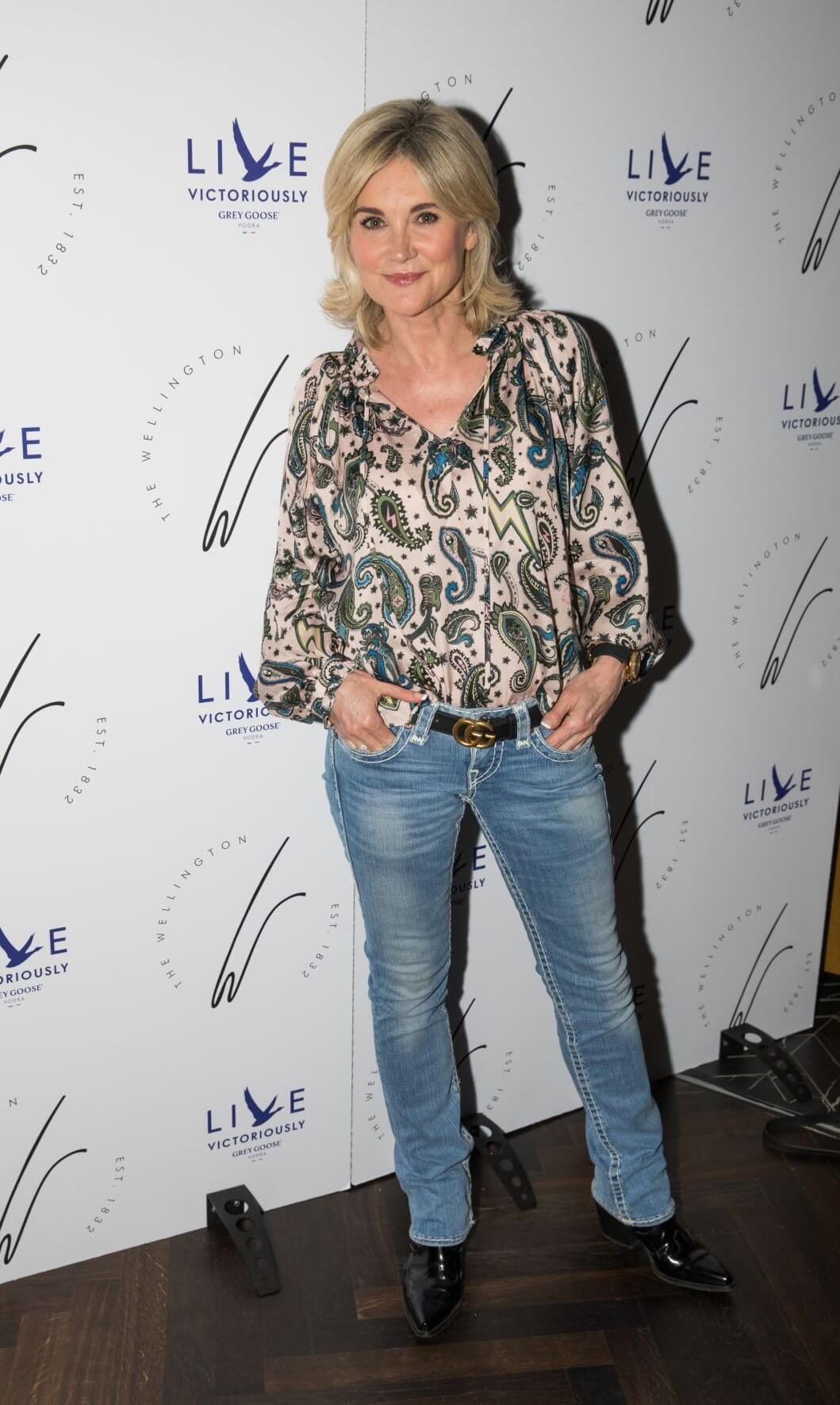 Anthea Turner  In Printed Embroidery Full Sleeves Top With Blue Denim Jeans At The Gatekeeper Novel Launch in London