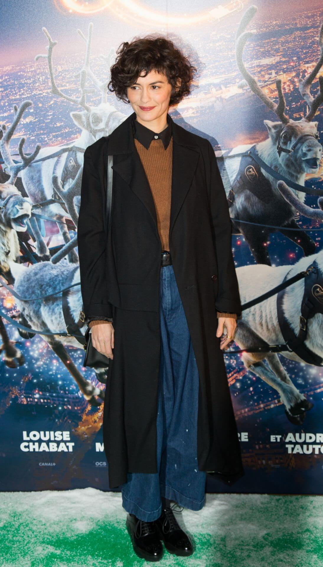 Audrey Tautou  In a Black Long Overcoat With Blue Denim Flare Pants & Brown Collar Top