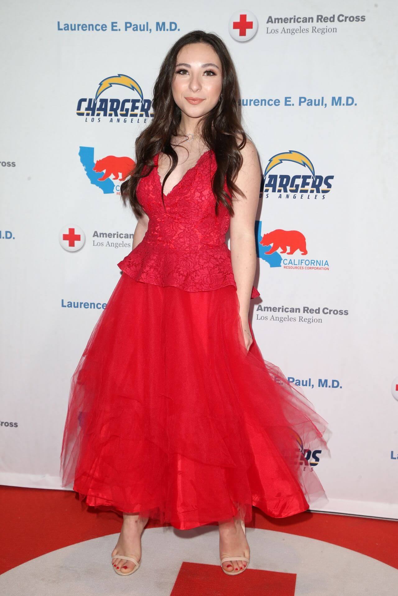 Ava Cantrell  In Red V Neck Net Fabric Gown Dress At Red Cross Los Angeles Humanitarian Awards