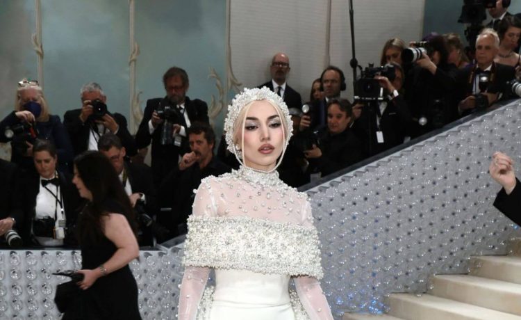 Ava Max In White With Pearl Design Long Flare Gown At Met Gala