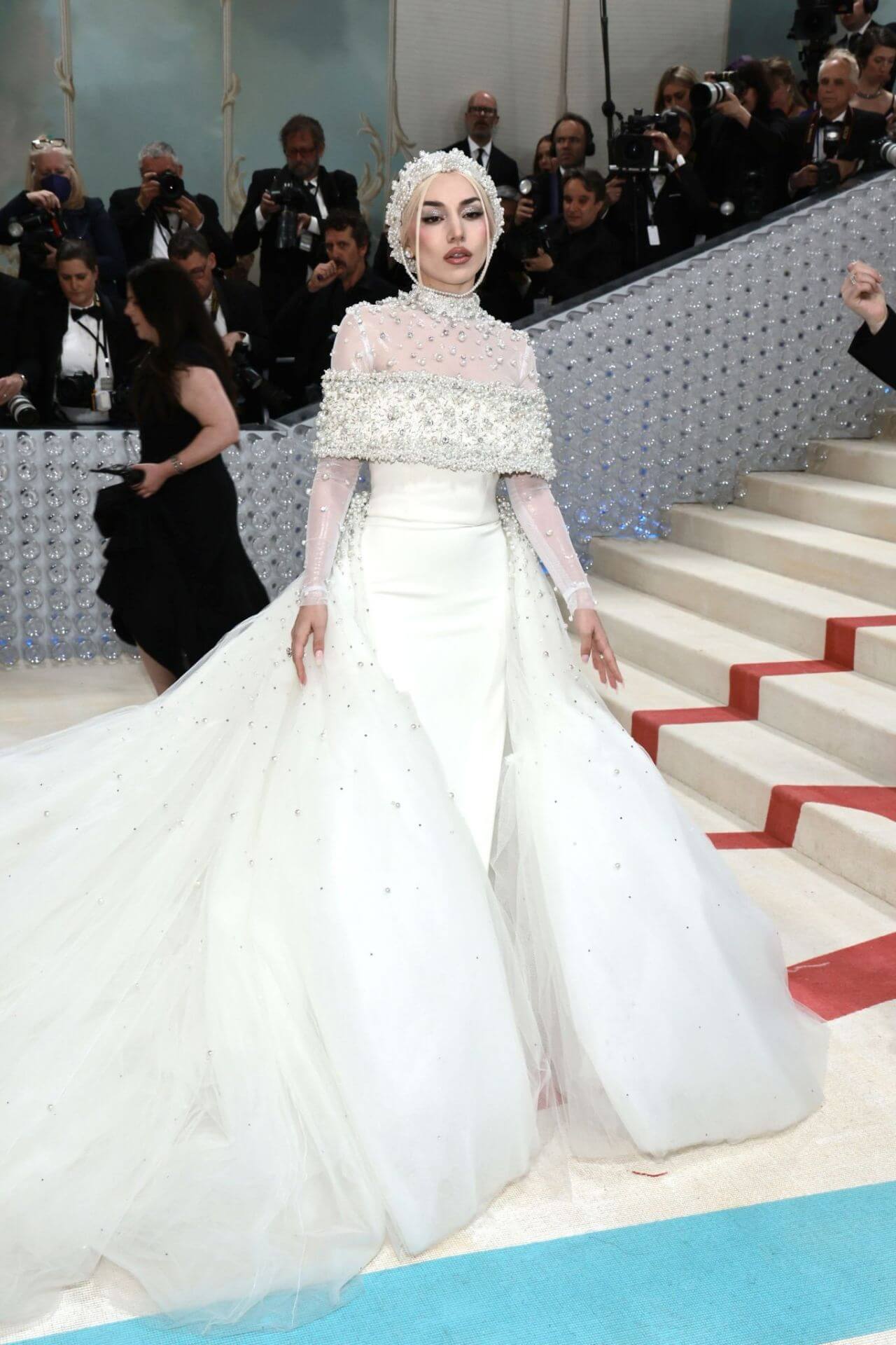 Ava Max In White With Pearl Design Long Flare Gown At Met Gala