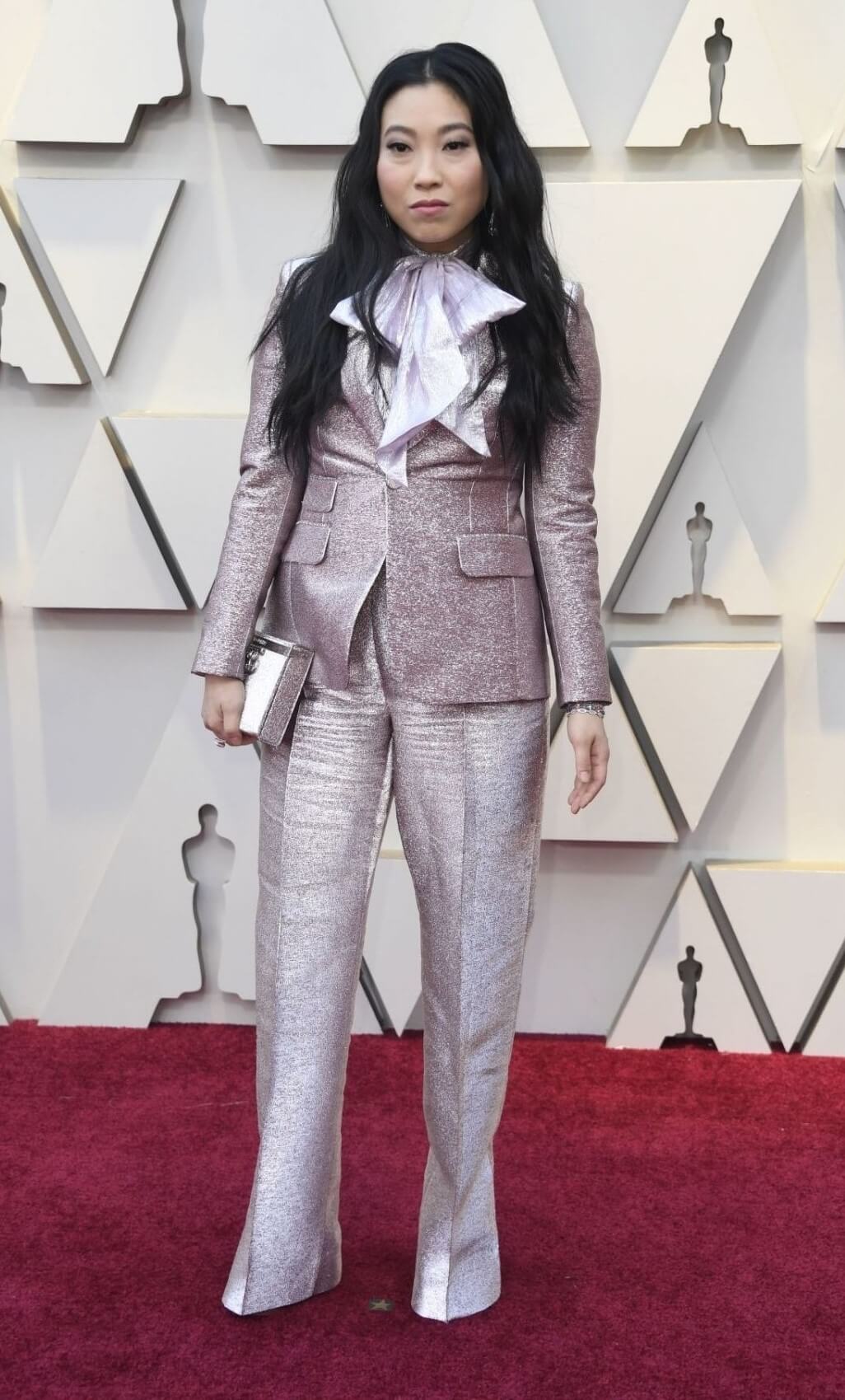 Awkwafina In Lavender Shimmery Blazer & Silver Pants With Bow Style At Oscars  Red Carpet