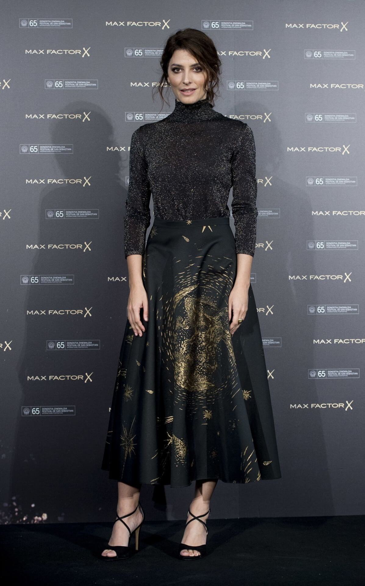 Barbara Lennie In Shimmery High Neck Full Sleeves Golden Printed Long Dress At Wins the Max Factor Award in San Sebastián