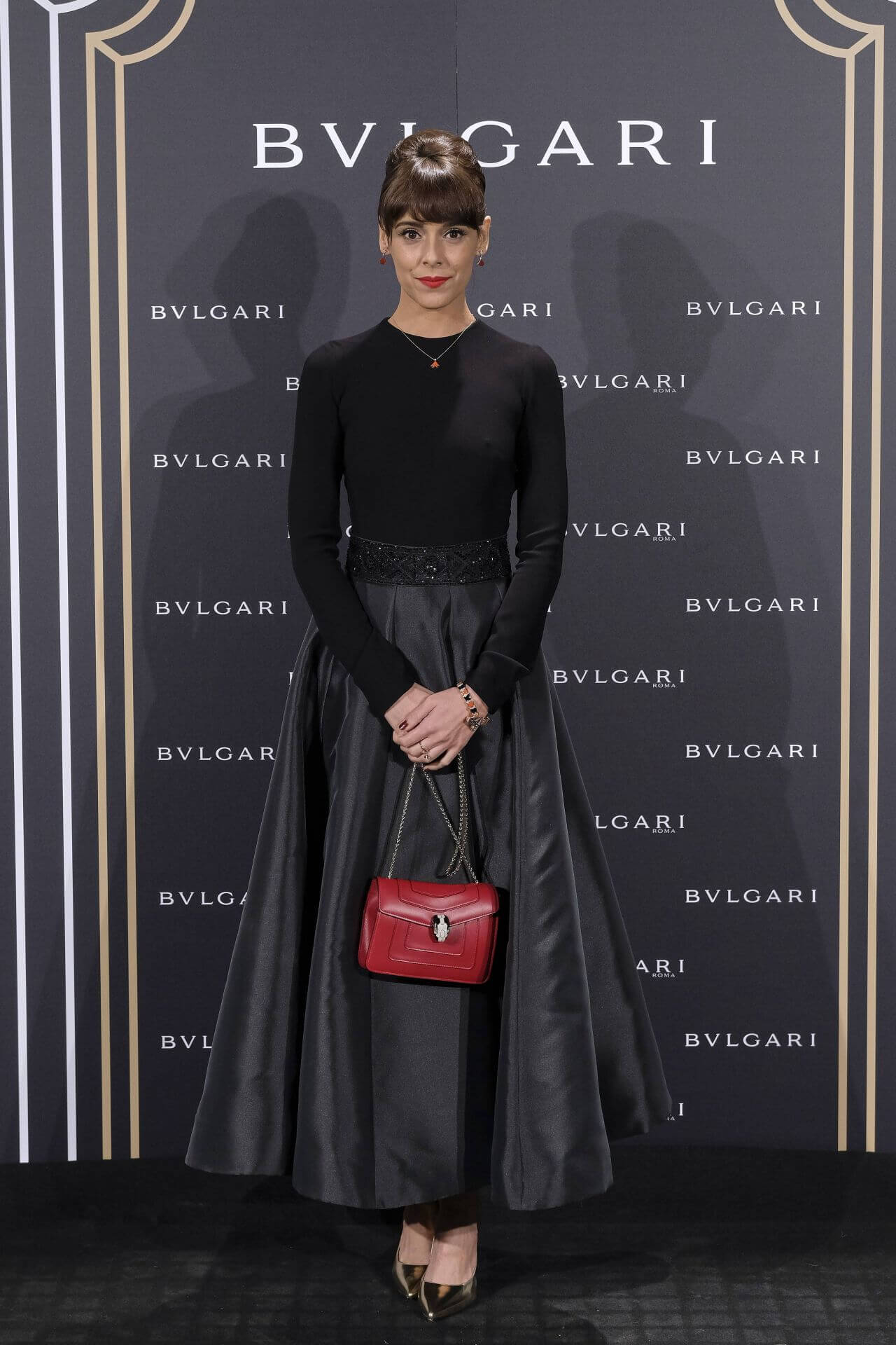 Belen Cuesta In Black Full Sleeves Top With Pleated Long Flare Skirt outfits At  Bulgari Cocktail Event in Madrid