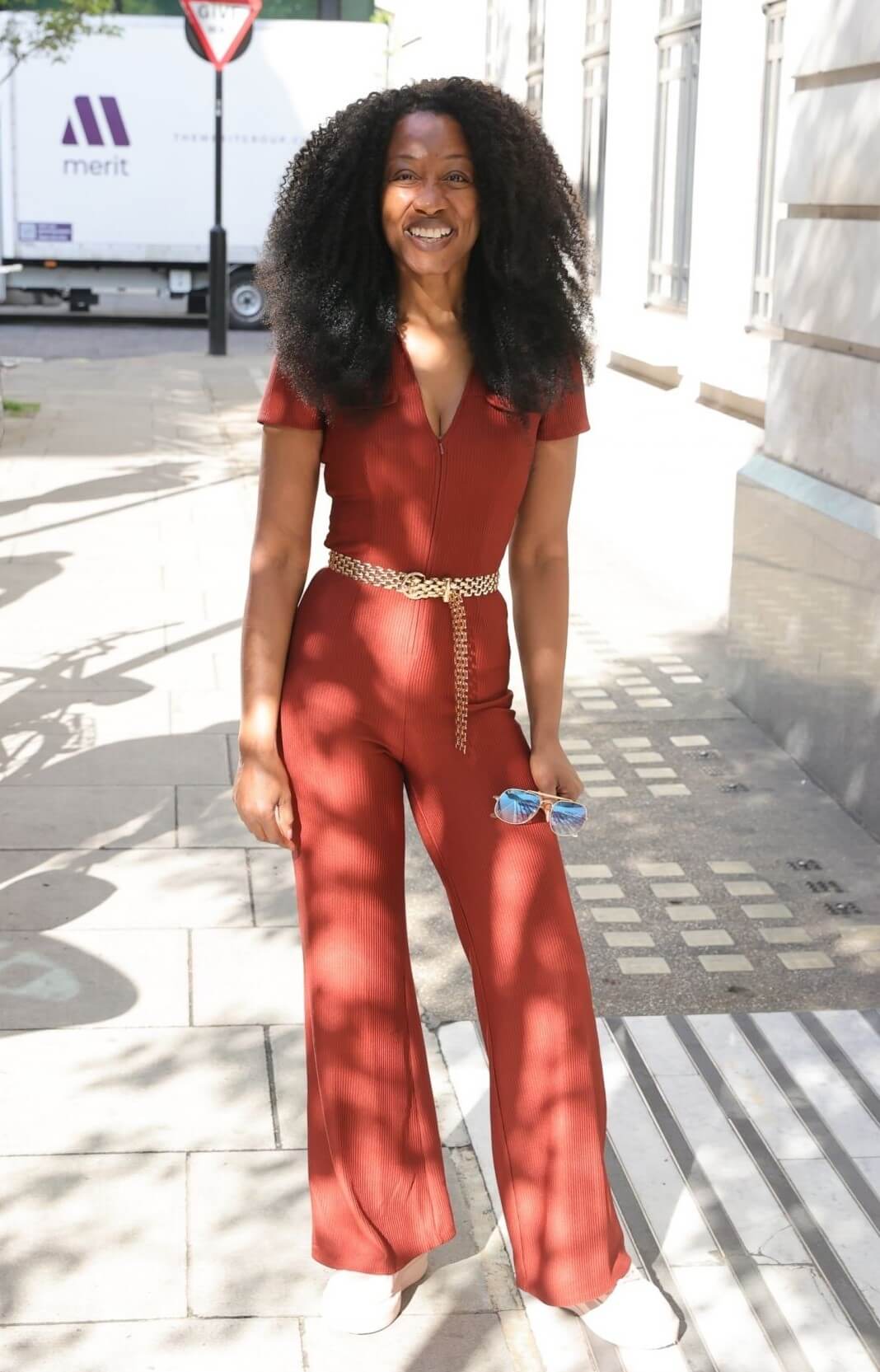 Beverley Knight In Brown Half Sleeves Jumpsuit & Golden Waist Belt With White Shoes