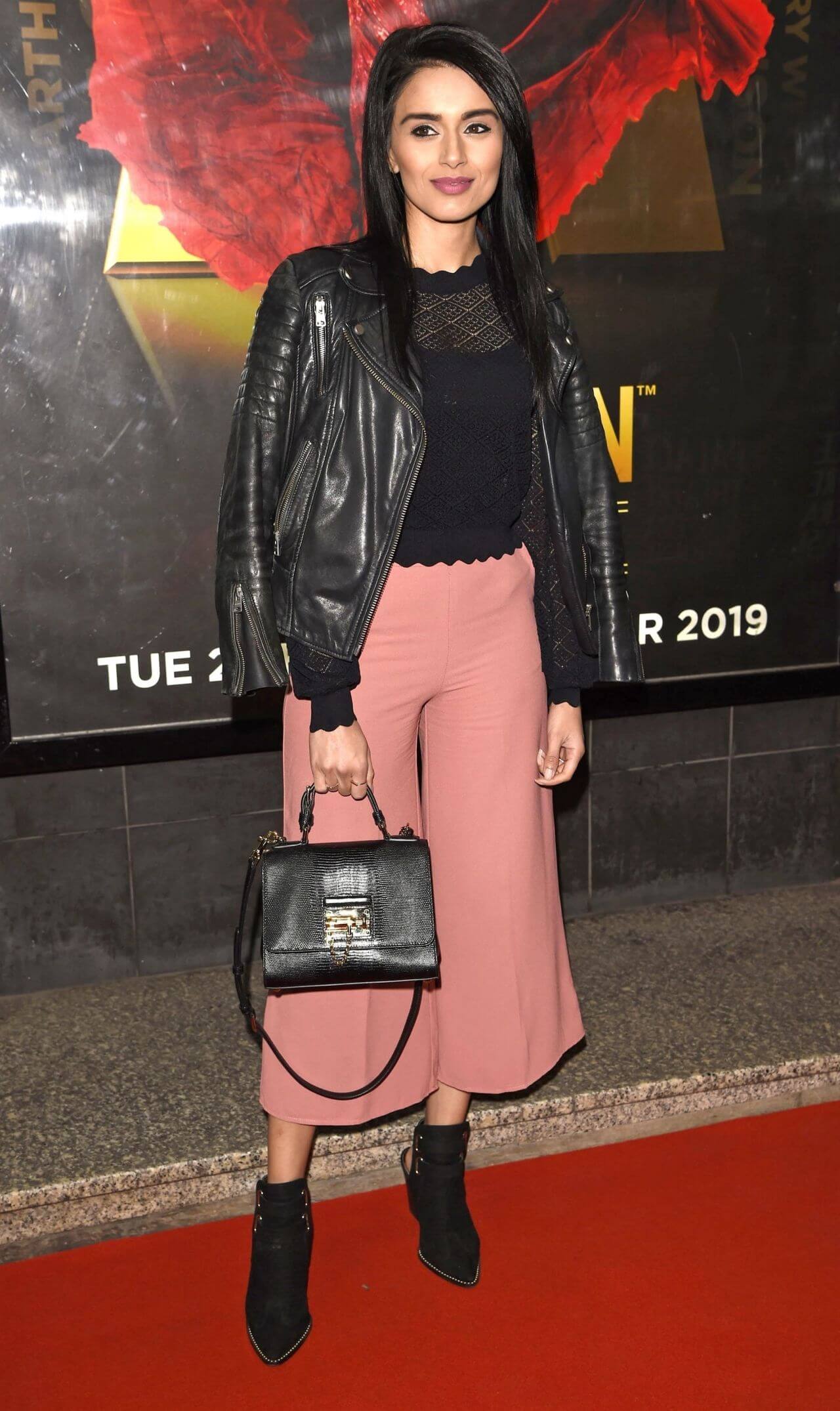 Bhavna Limbachia  In Black Top & Dusky Pink Flare Pants With Leather Jacket