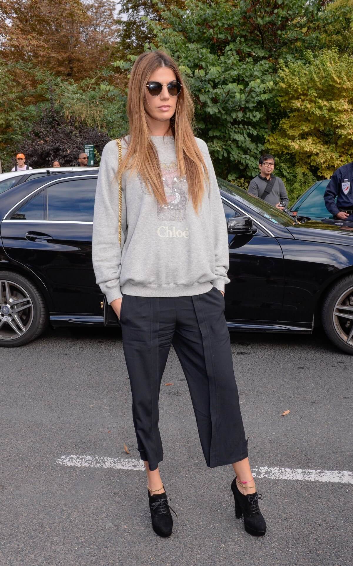 Bianca Brandolini d’Adda In Grey Sweatshirt With Black Pants At The Chloe Spring/Summer Show in Paris Fashion Week