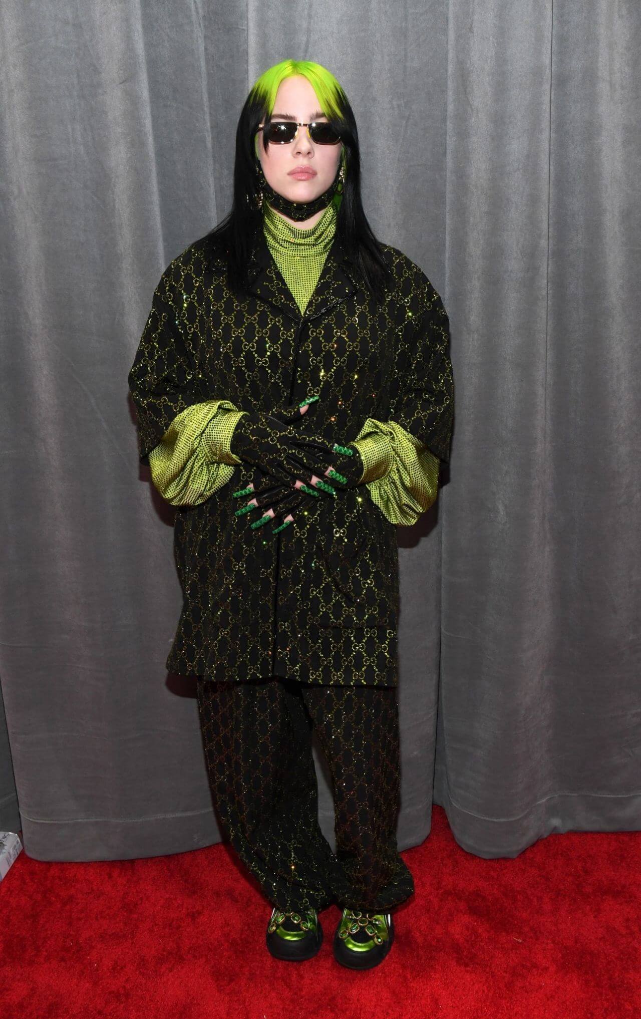Billie Eilish  In Olive Green Shimmery Baggy Sleeves Coat With Pants At GRAMMY Awards