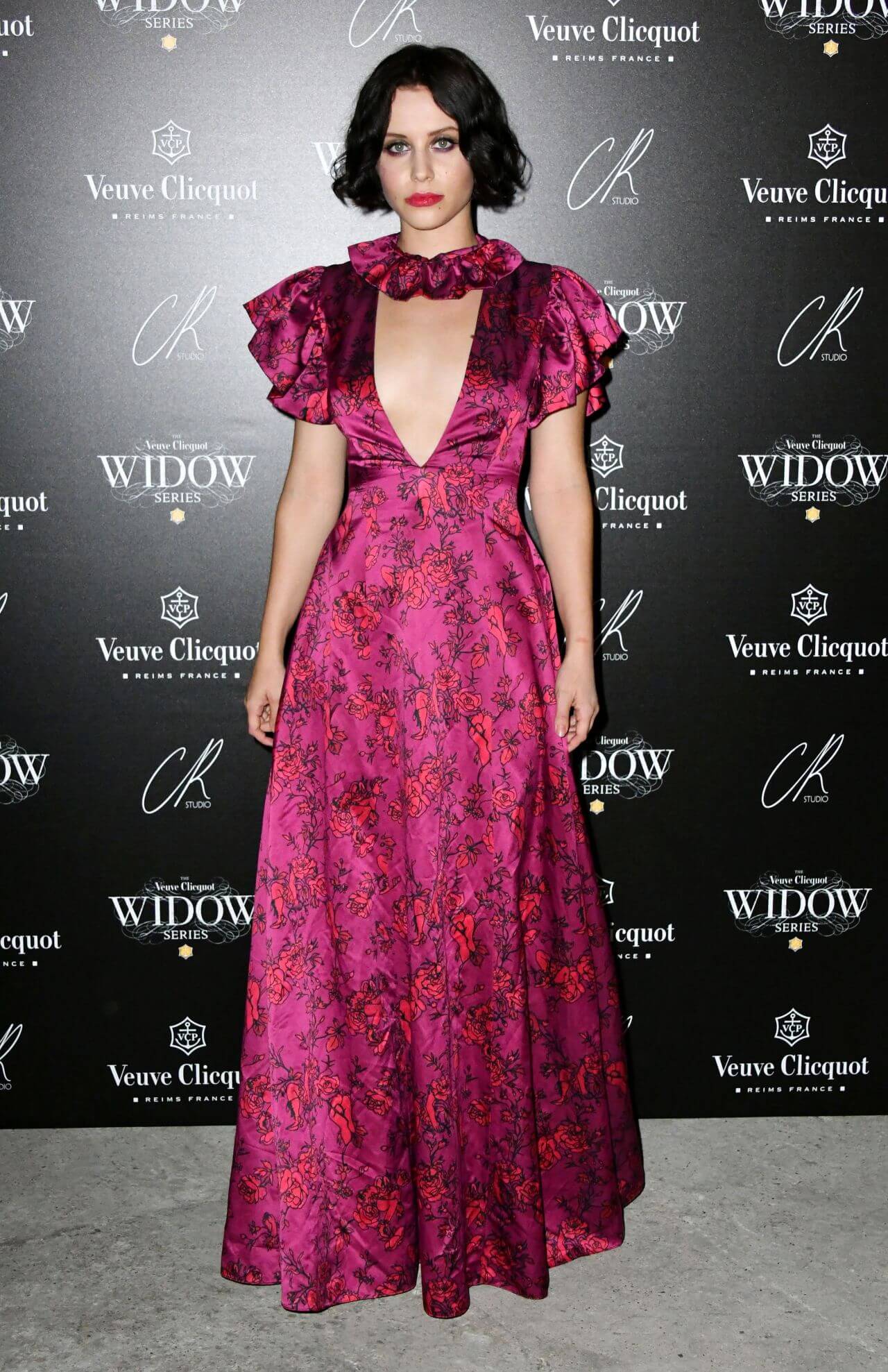 Billie JD Porter  In Pink Floral Printed V Neckline Pleated  Long Gown At The Veuve Clicquot Widow Series VIP Launch Party in London