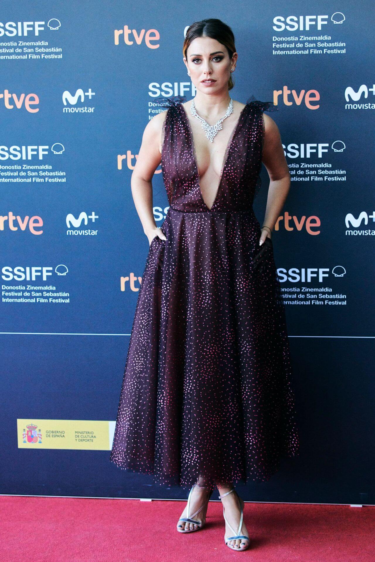 Blanca Suarez  In Purple V Neckline Printed Long Gown At “Tiempo Despues” Premiere at the 66th San Sebastian FF