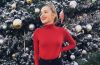 Brady Reiter In Red Full Sleeves High Neck Top With Black Buttoned Mini Skirt Outfit