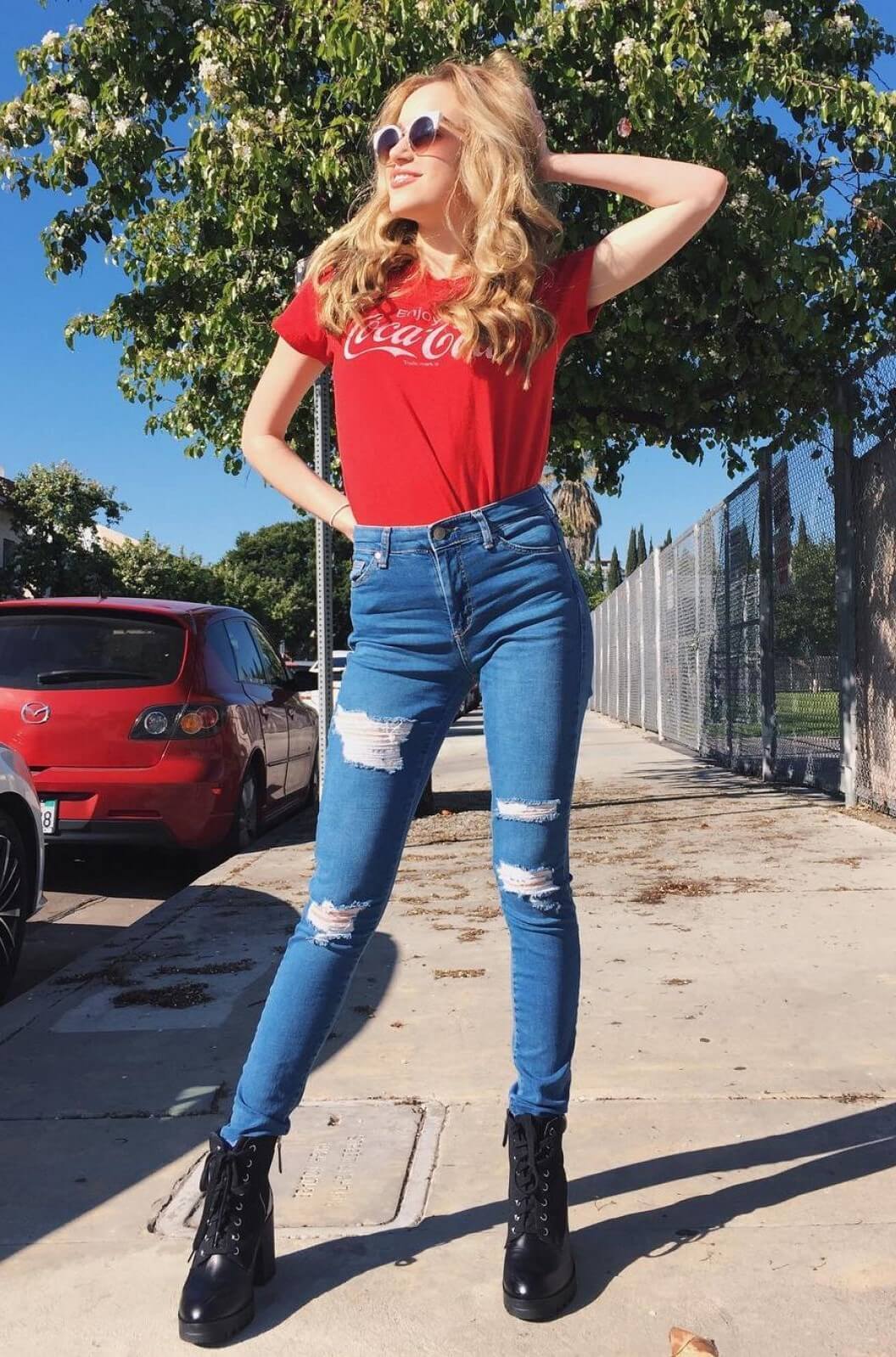 Brady Reiter In Red T-shirt & Blue denim Ripped Jeans With Cool Sunglasses