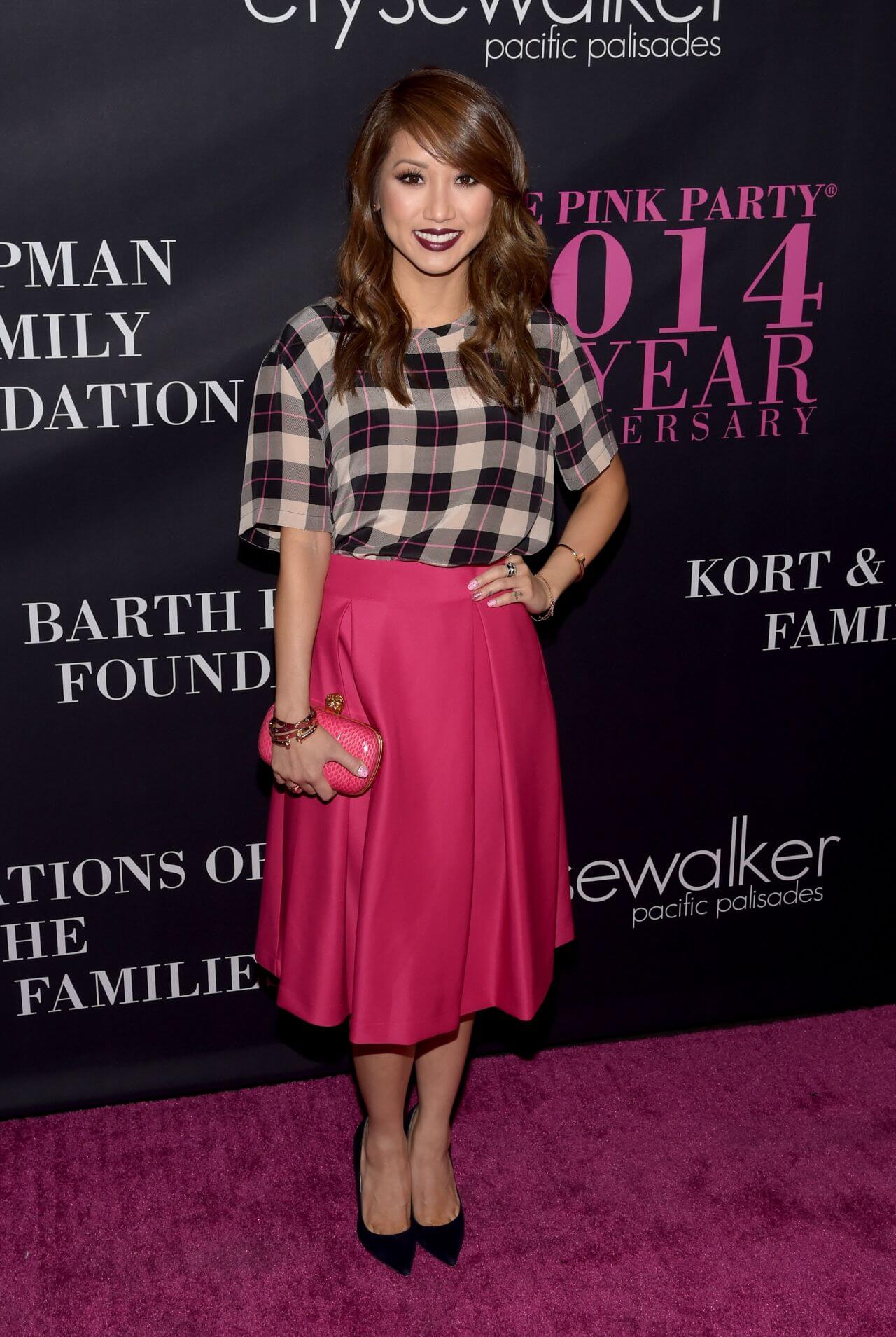Brenda Song In Checked Top With Pink Skirt Outfit At Pink Party in Santa Monica