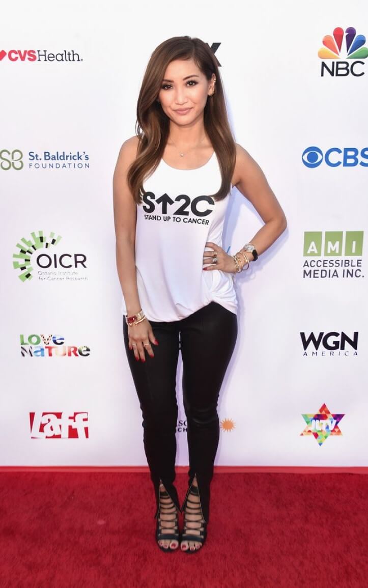 Brenda Song  In White Sleeveless T-shirt With Black Pants At Stand Up To Cancer Live in Santa Monica