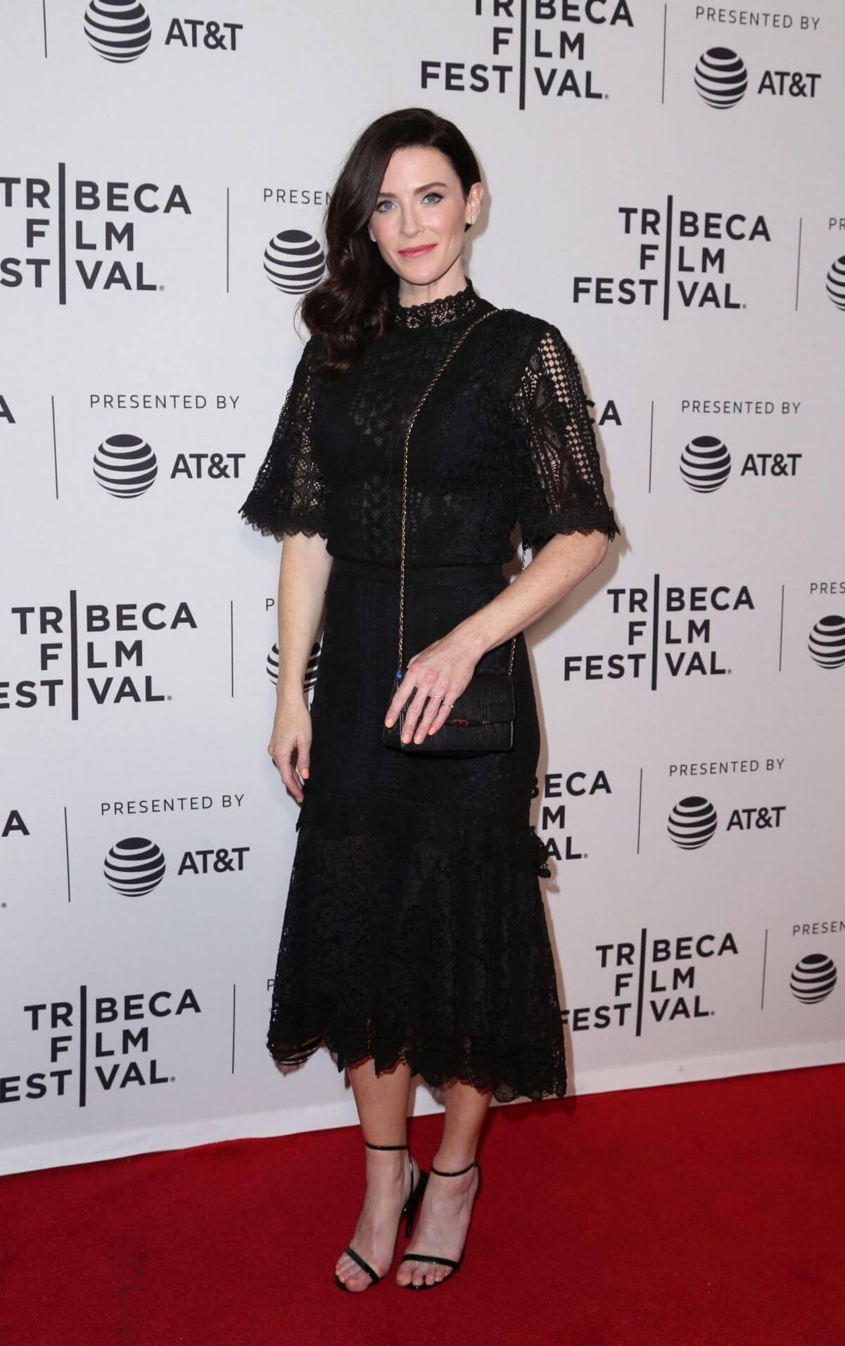 Bridget Regan  In Black Half Sleeves Layered  Long Dress With Sling Bag At“Devil’s Gate” Premiere at Tribeca Film Festival