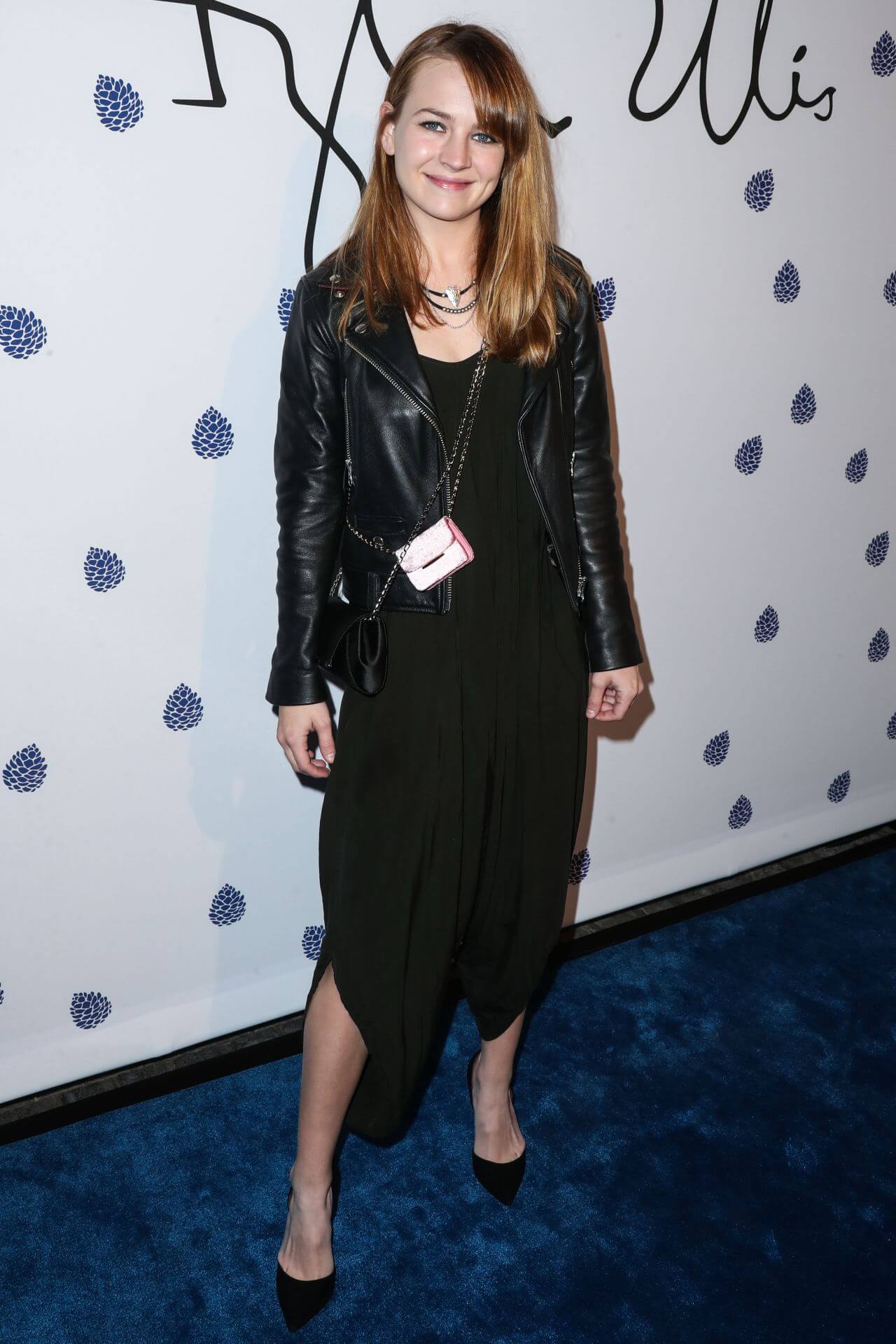 Britt Robertson  In a Long Black Dress With a Leather Jacket