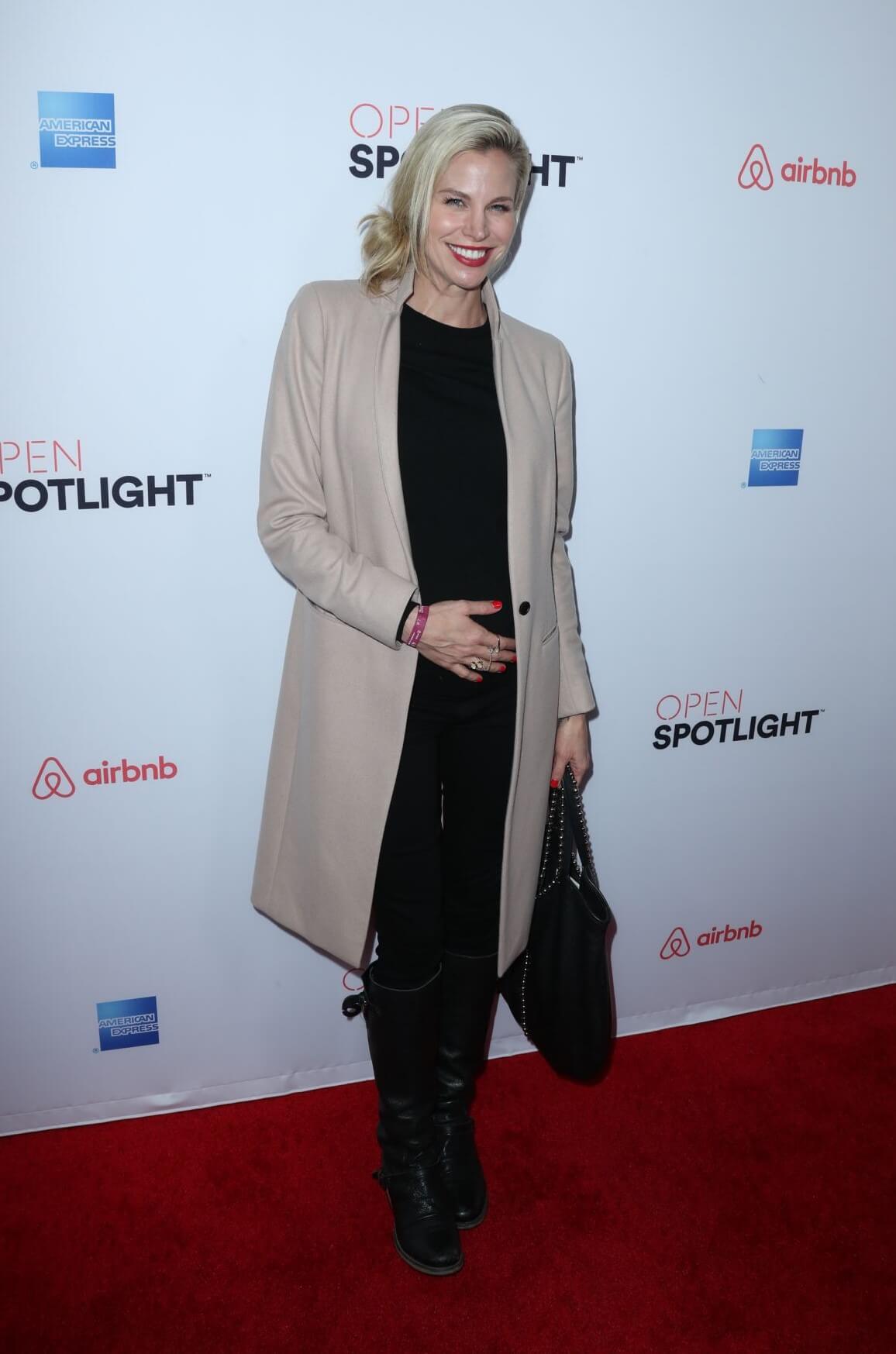 Brooke Burns  In Off White Long Coat Under Black Dress At Airbnb Open Spotlight in Los Angeles