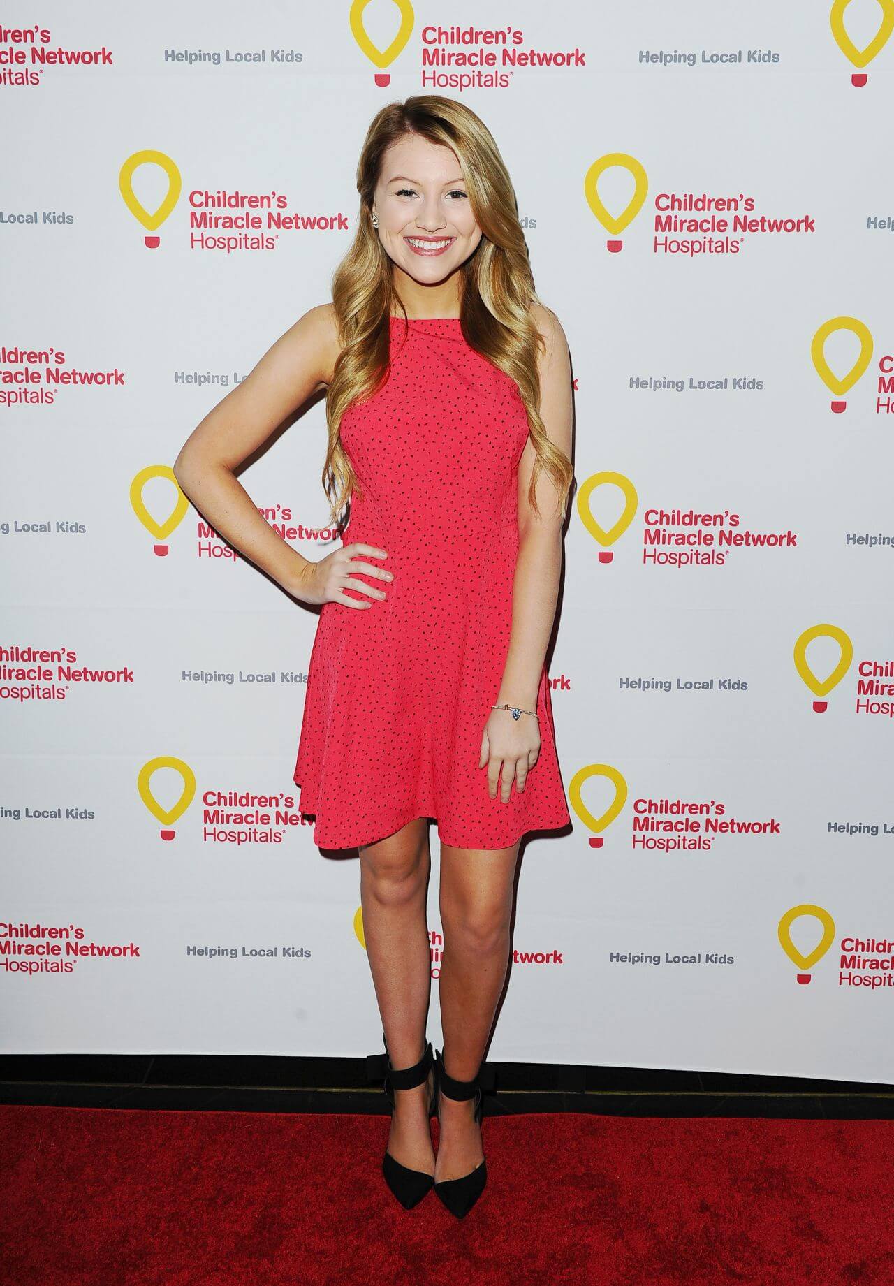 Brooke Sorenson  In Red Sleeveless Short Dress At Children’s Miracle Network Hospitals’ Winter Wonderland Ball in Hollywood