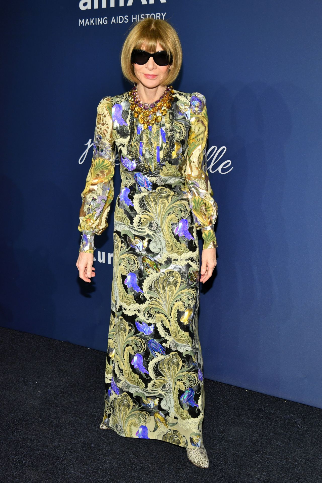 Anna Wintour  In Yellow Printed Puffed Sleeves Long Dress At amfAR Gala Benefit For AIDS Research