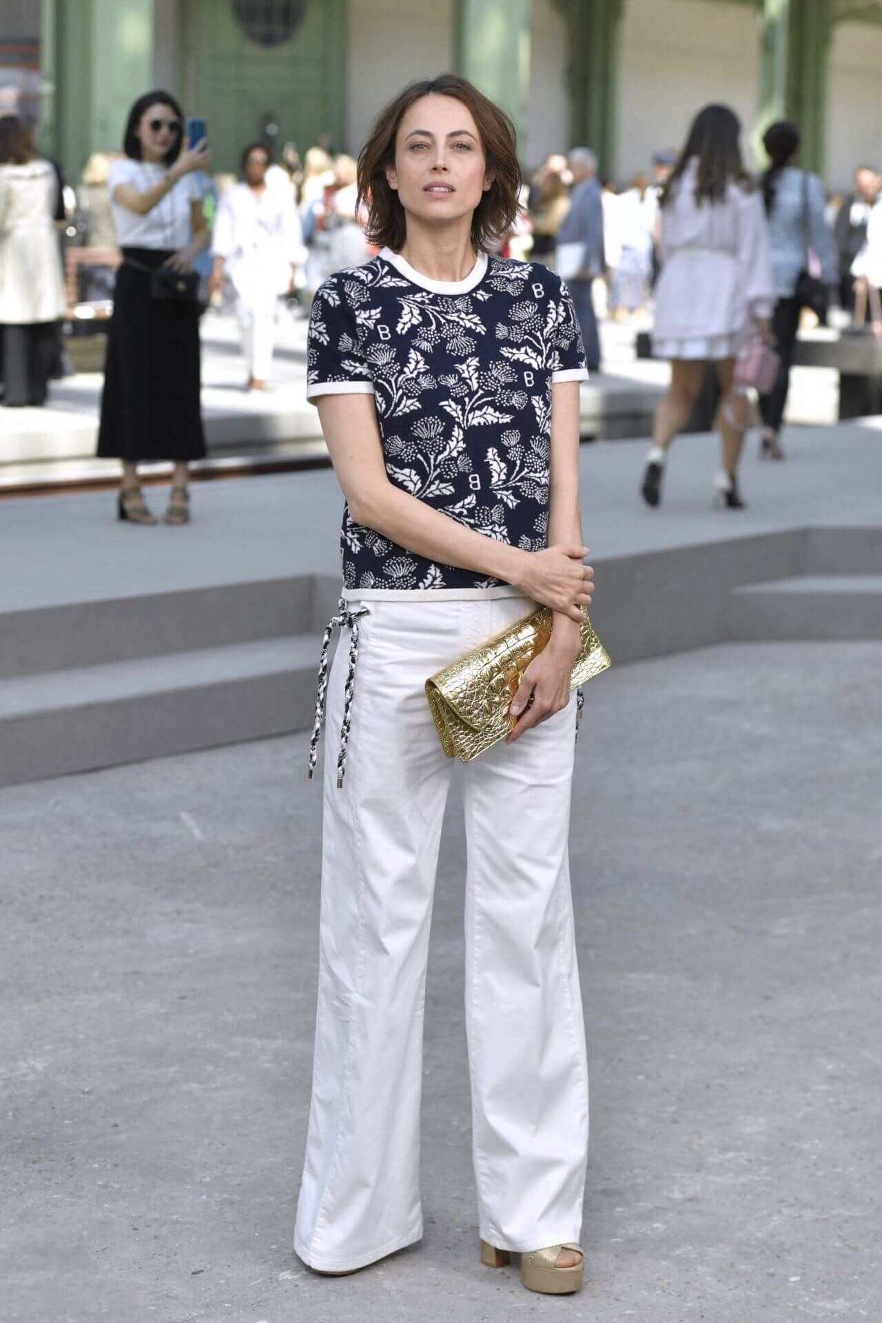 Anne Berest In Blue With White Border Half Sleeves Top & Pants At  Chanel Cruise Collection Photocall in Paris