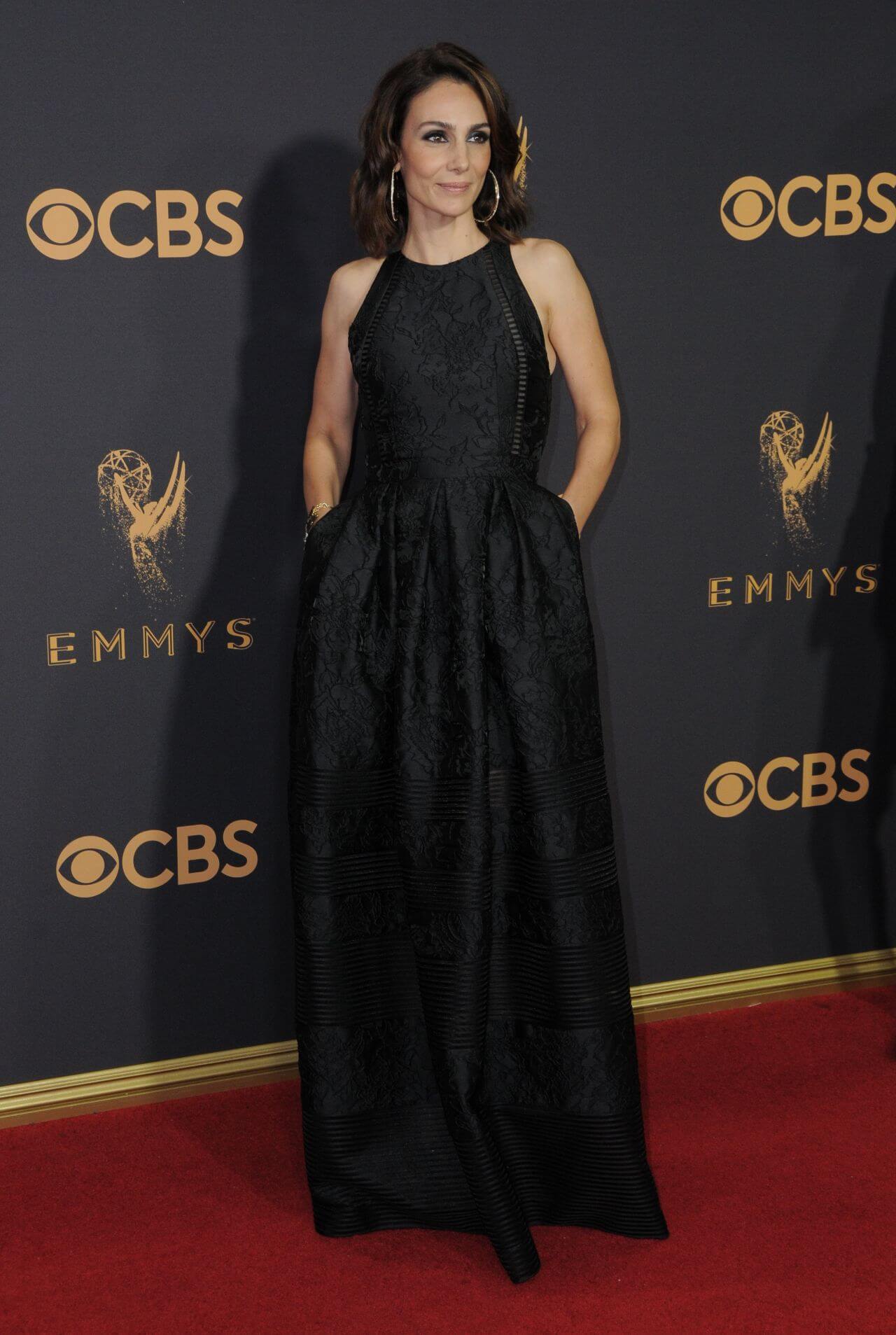 Annie Parisse In Black Sleeveless Long Flare Gown At Emmy Awards in Los Angeles