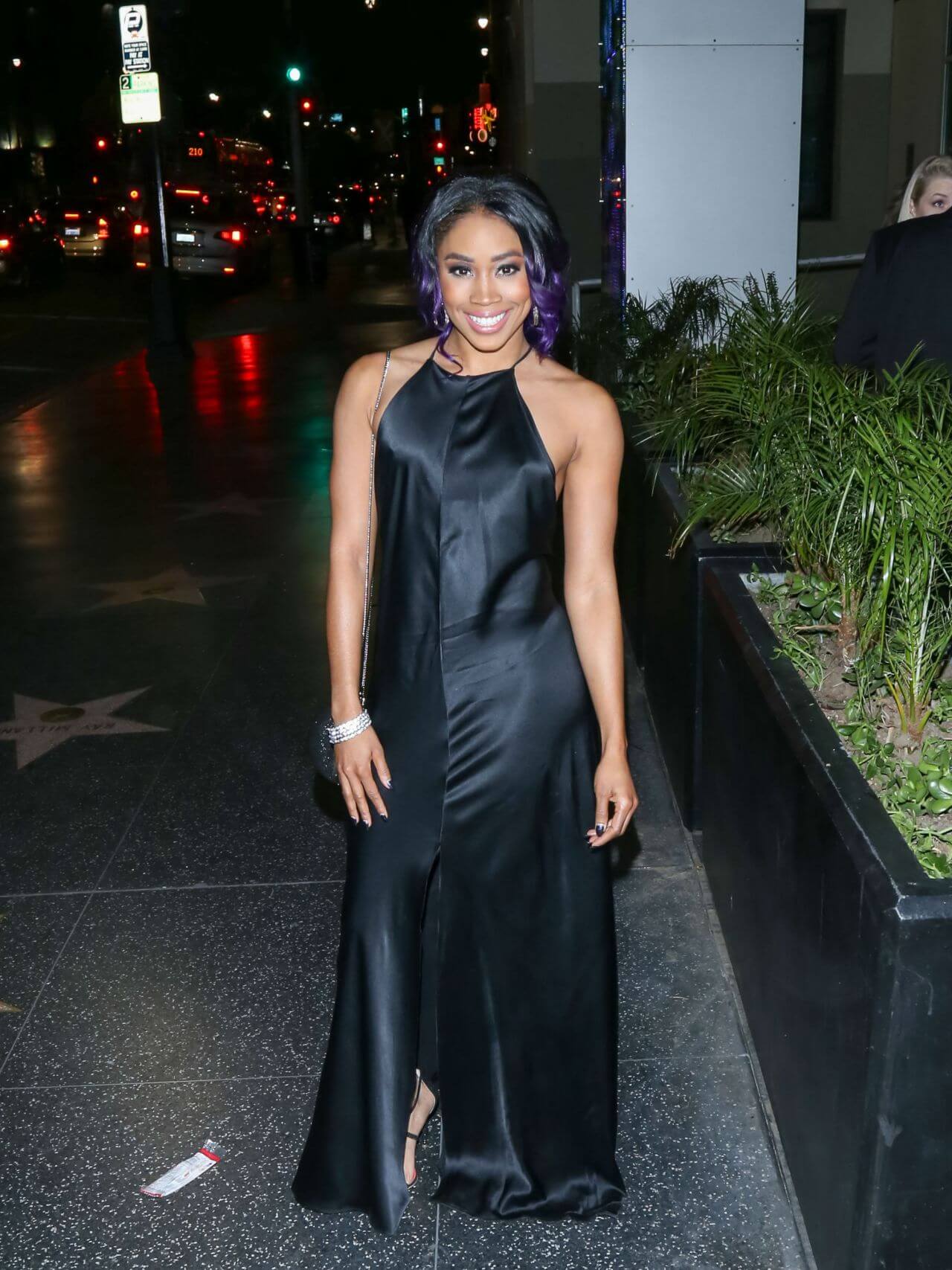 Ariane Andrew In Shiny Black Halter Neck Long Maxi Dress At the House of Macau in Los Angeles