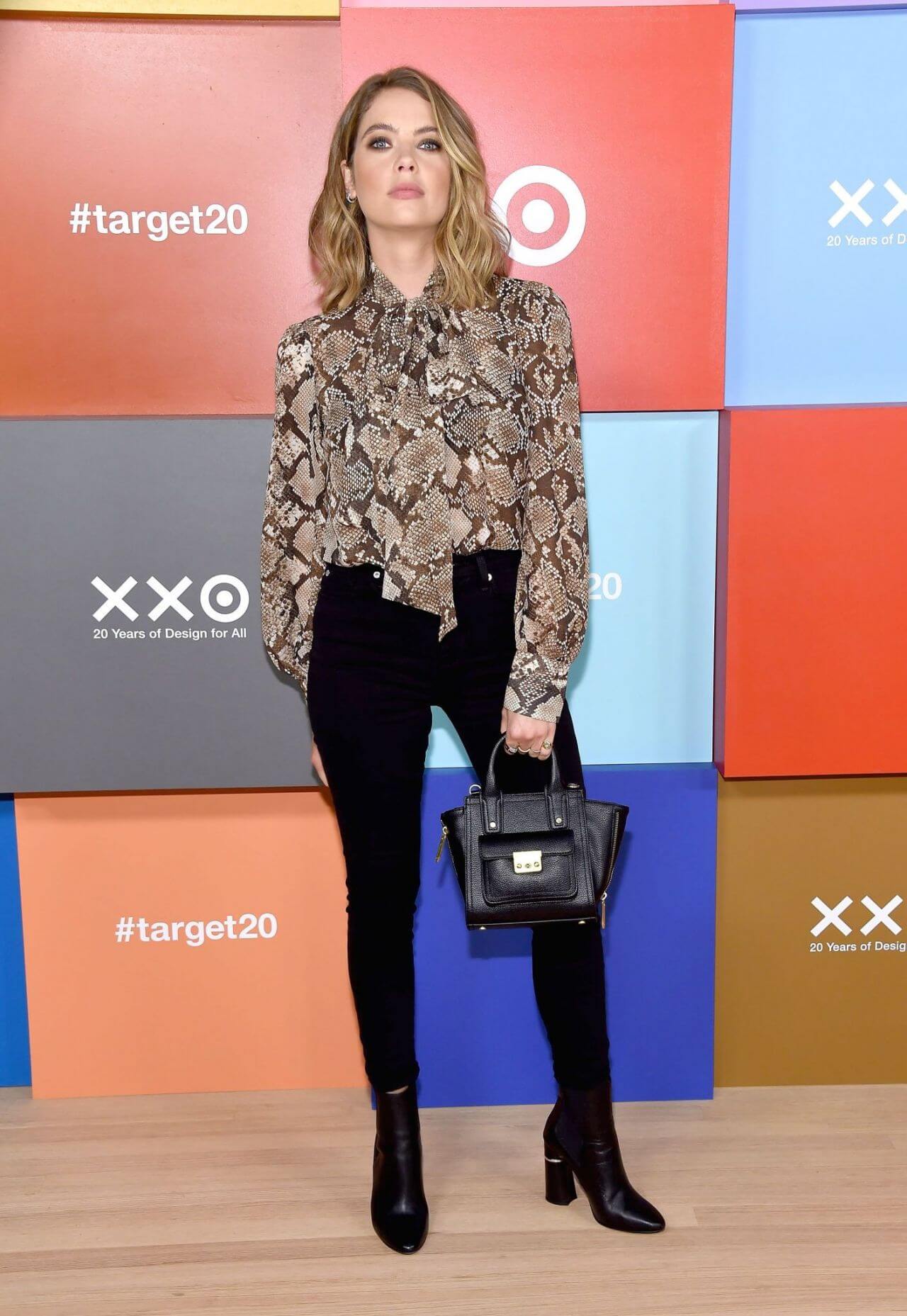 Ashley Benson In Printed Full Sleeves Top With Black Jeans At Target 20th Anniversary Collection in NY
