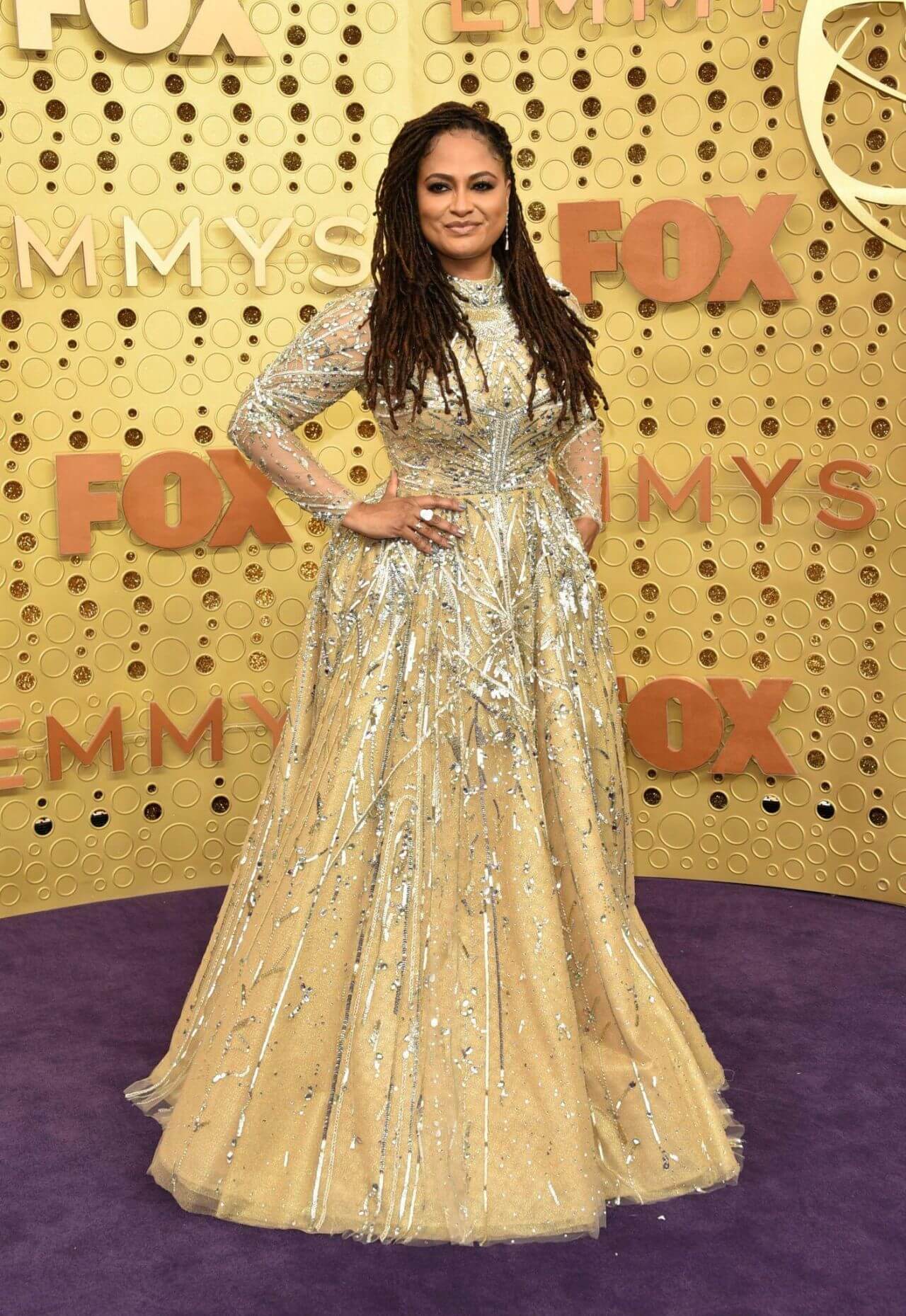 Ava DuVernay  In Golden Shimmery Work Long Flare Gown At Emmy Awards in Los Angeles