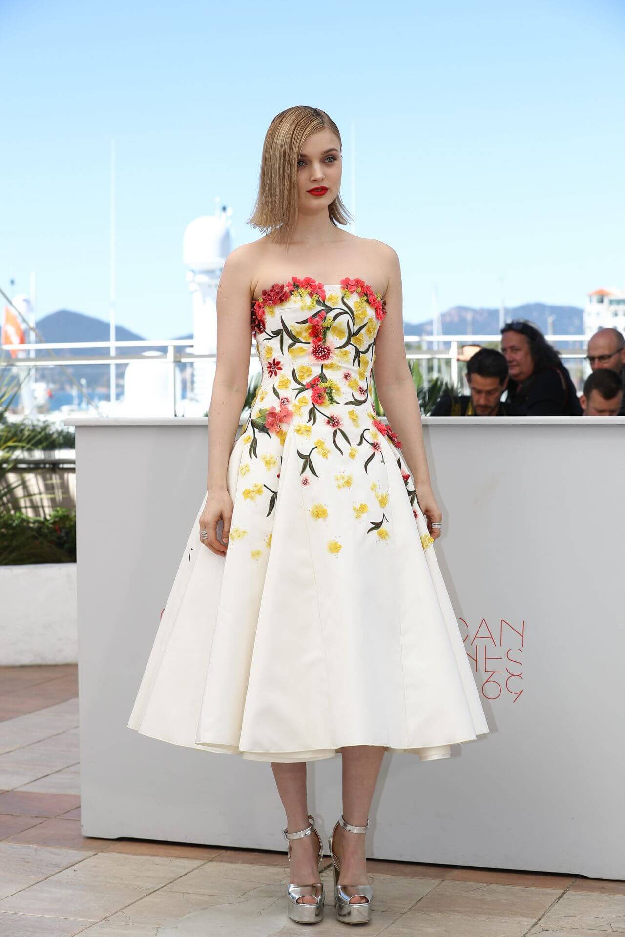Bella Heathcote In Off White With Floral Design Strapless Gown Dress