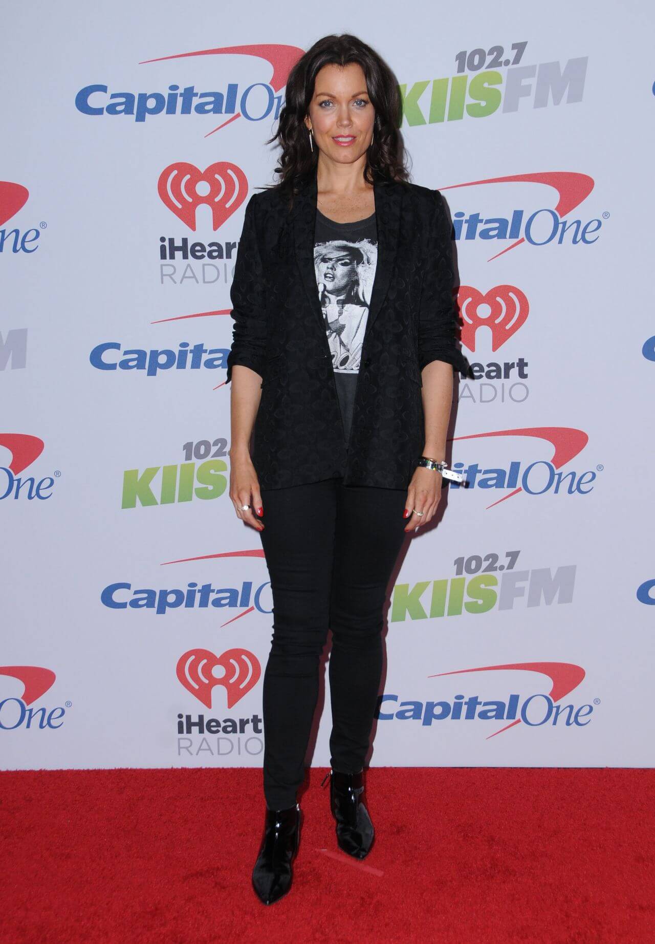 Bellamy Young In Black Coat Under T-shirt With Jeans