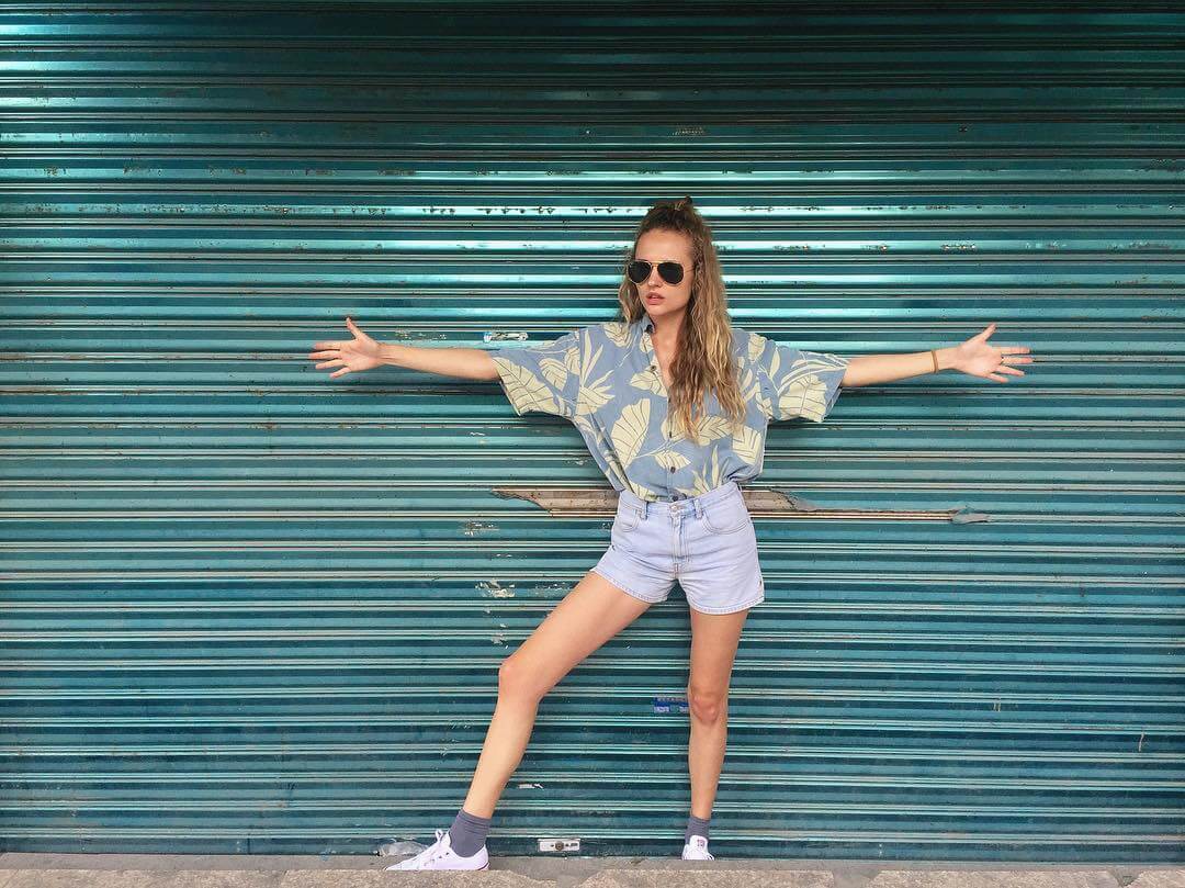 Madison Riley In Grey Printed Crop Shirt & Denim Shorts With Cool Sunglasses