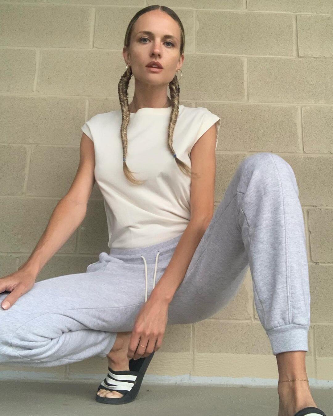 Madison Riley  In White Top  With Grey Jeggings